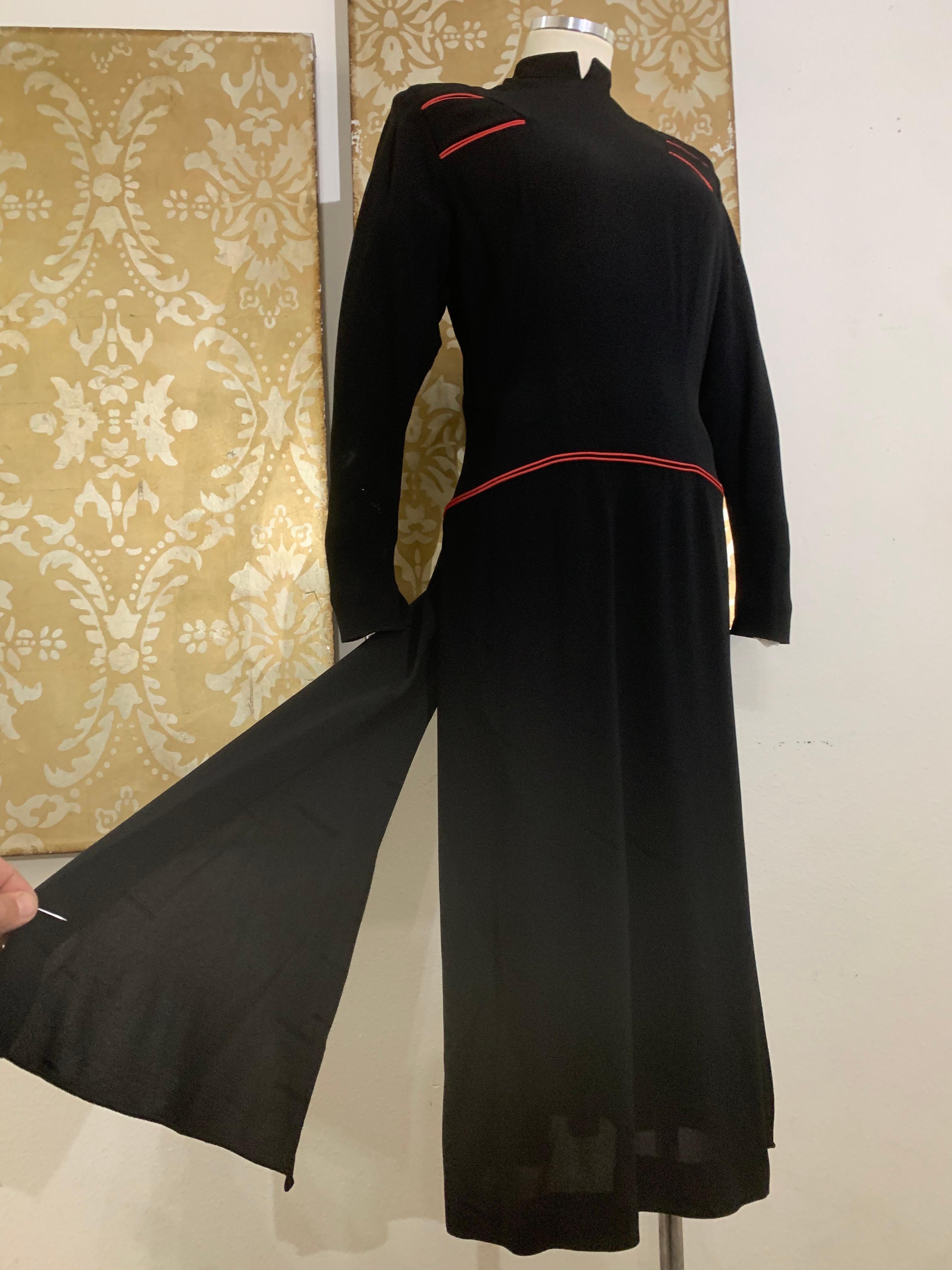 1940s Black Rayon Crepe Military-Inspired Tailored Day Dress w Red Piping:  A super rare style in excellent, never-worn condition, this early 40s form-fitting tailored calf dress features some sensational details:  Red piped functional breast