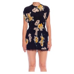 1940 Blusa negra de rayón con estampado floral y peplum