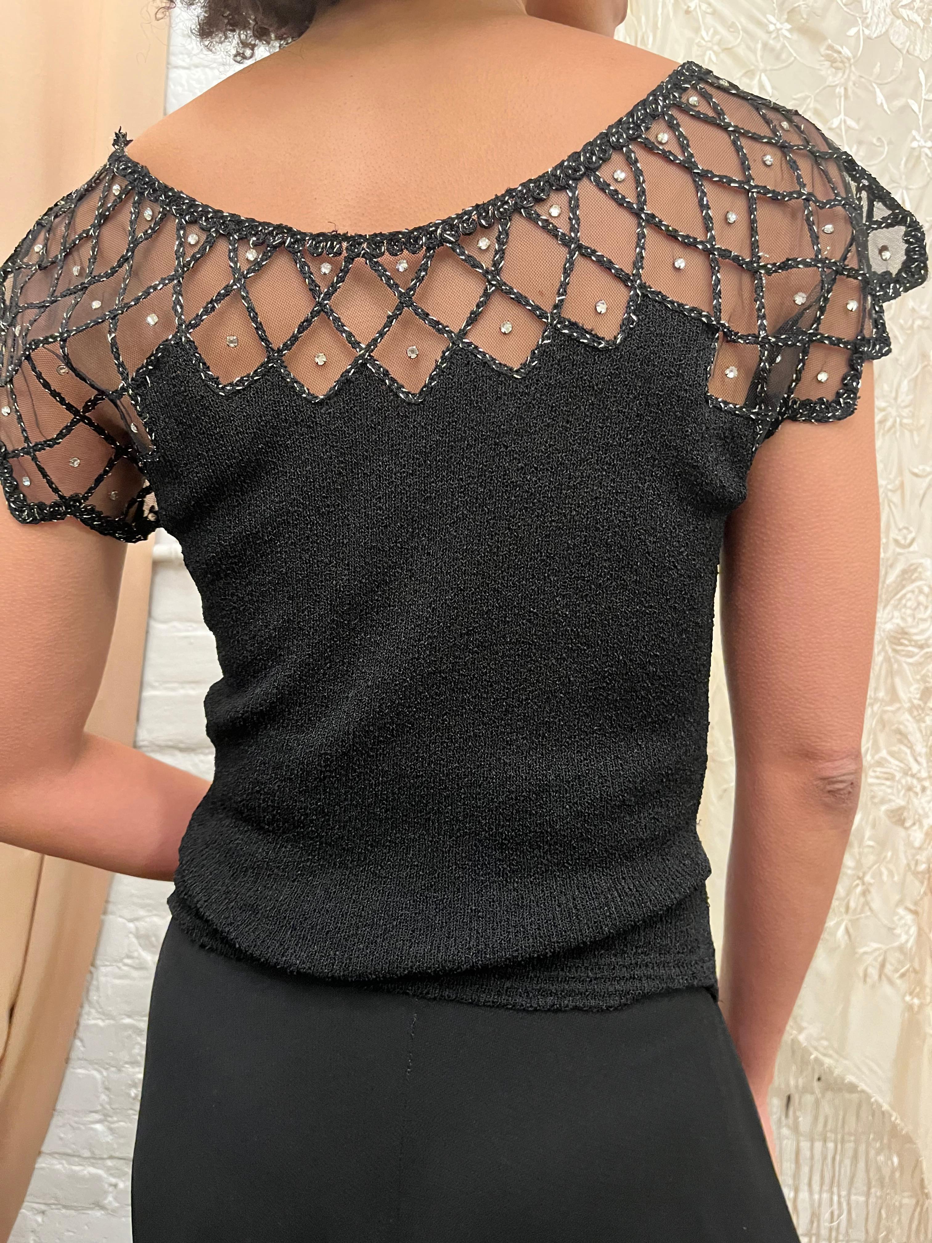 Incredible rare late 1940’s bouclé rib knit with lattice metallic accents & rhinestones. Best for an XS or Small. 