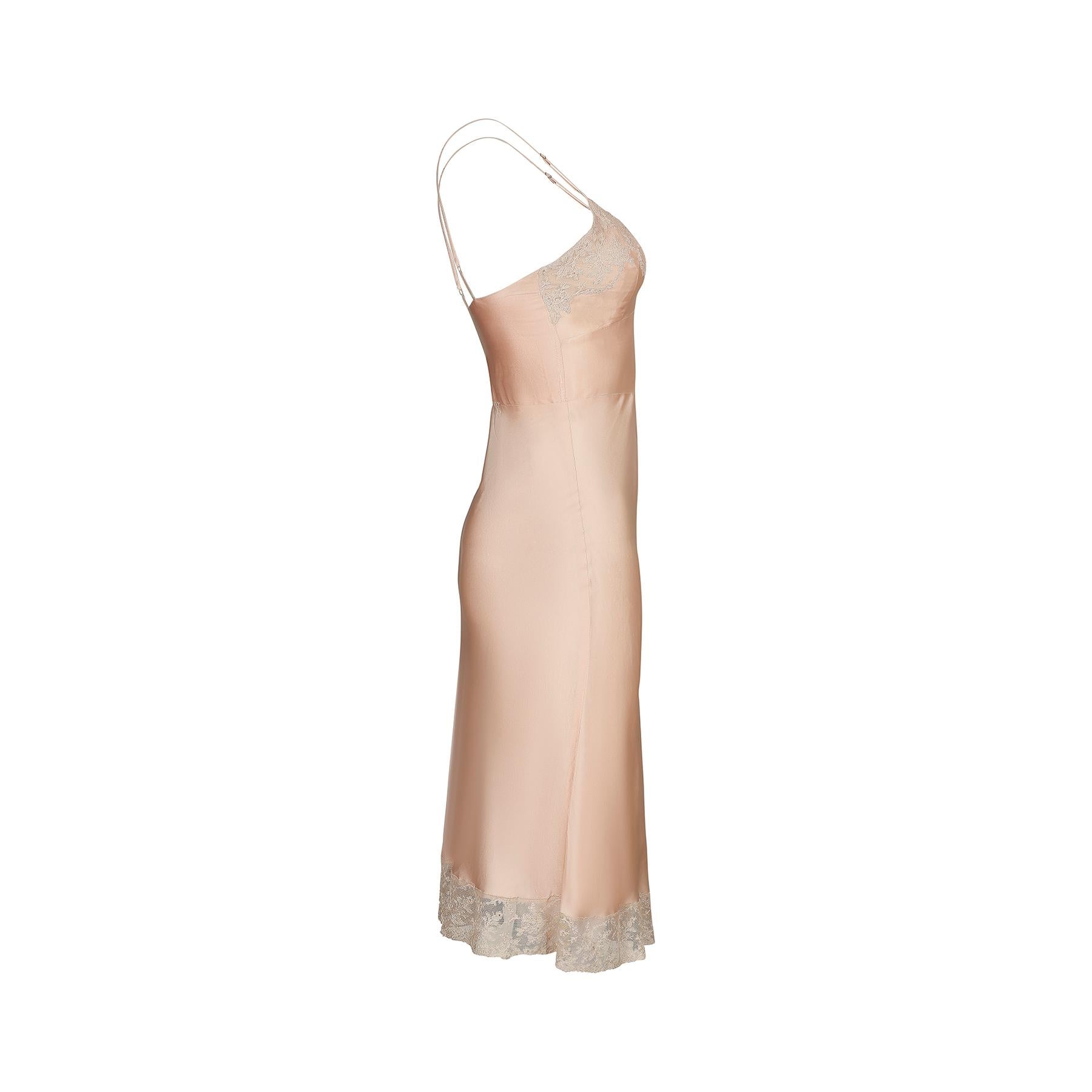 An original 1940s blush pink silk and lace slip with a fantastic retail label from upmarket department store Bonwit Teller of 5th Ave, New York. This is as good as it gets and this particular dress is in pristine vintage condition.

It has a