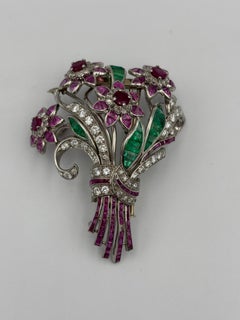 1940s Bouquet of Flowers Brooch. Platinum with rubies, pink sapphires, emeralds
