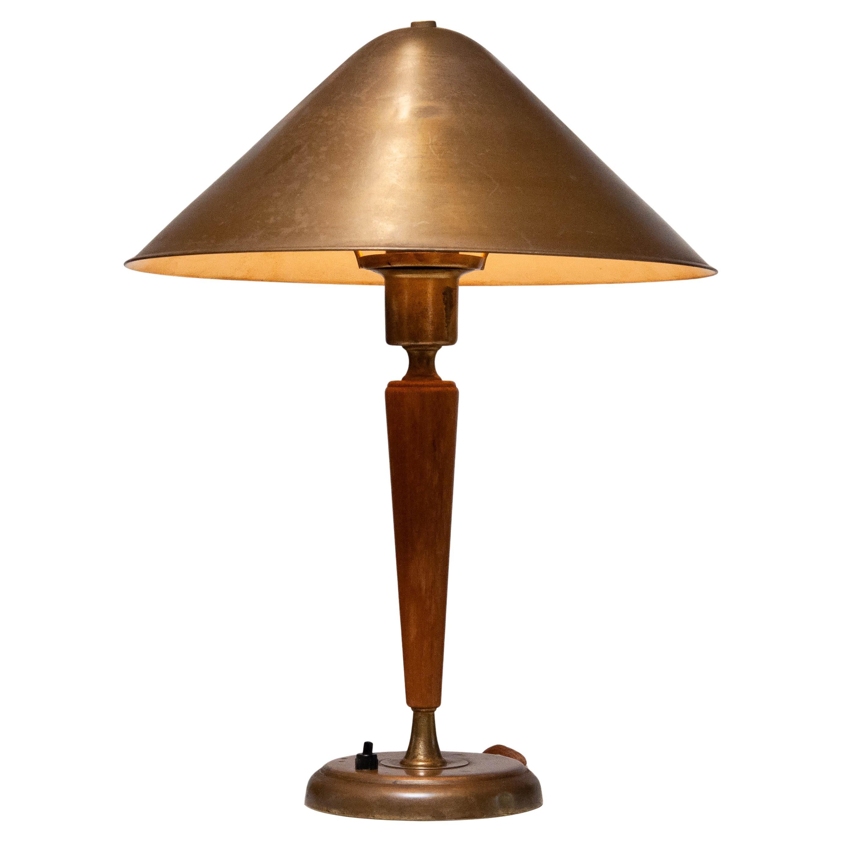 Lampada da tavolo in ottone e olmo del 1940 di Harald Notini per Böhlmarks