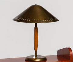 1940's Brass and Stained Teak Table Lamp Designed by Harald Notini For Böhlmarks