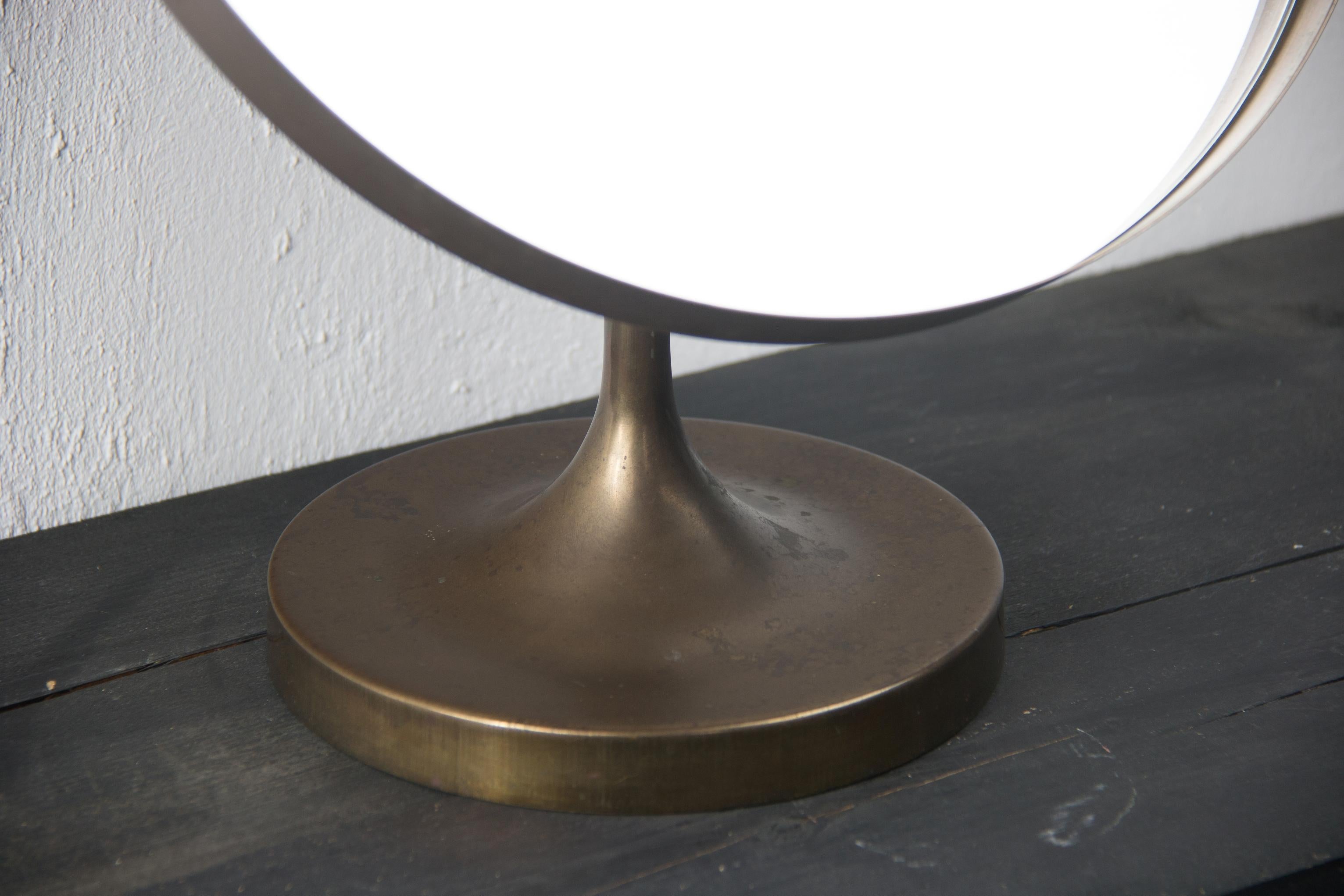 Rare table mirror in bronze from Sweden.
Attributed to Josef Frank.
Tulip shaped foot.
 