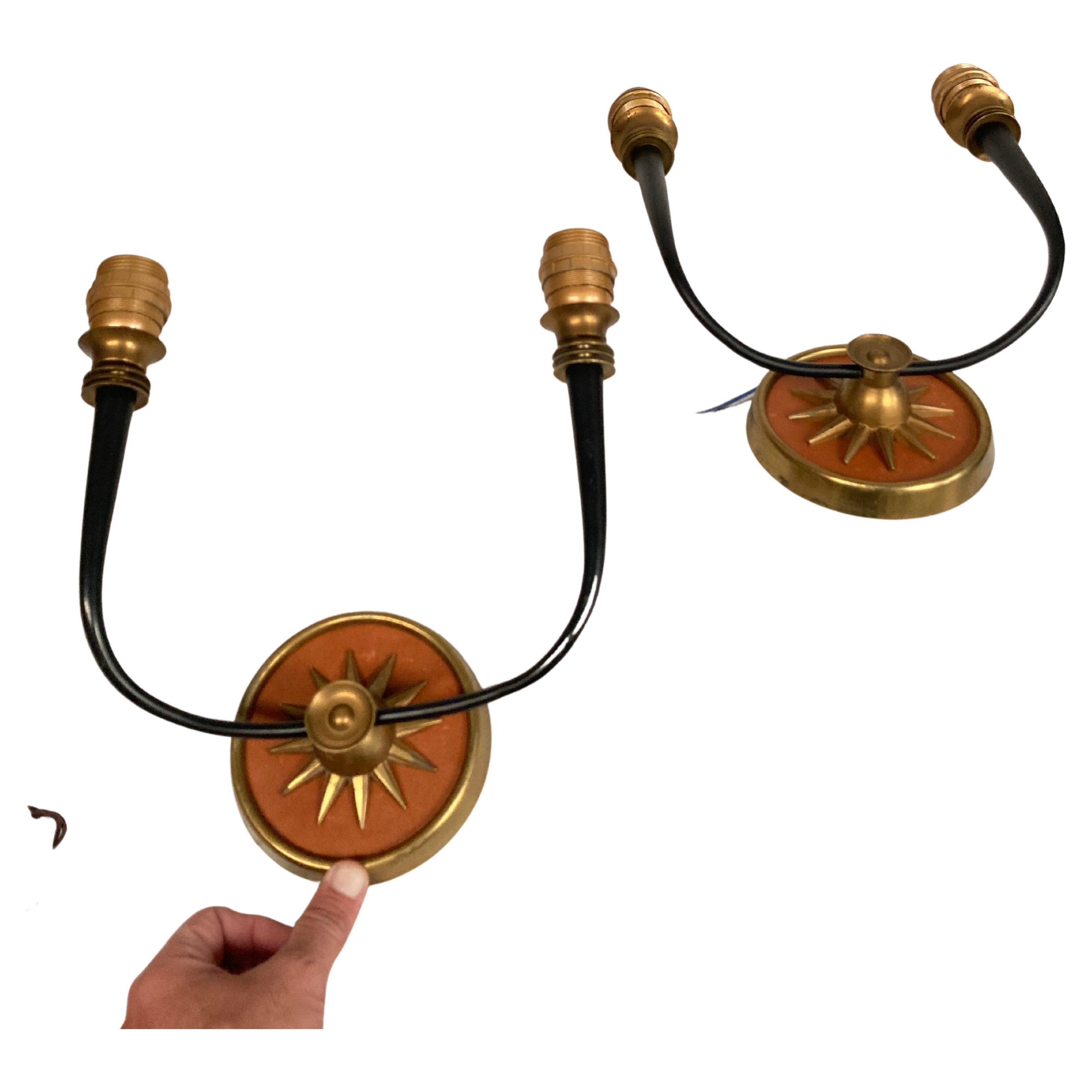 1940's bronze and leather sunburst sconces attributed to André Arbus