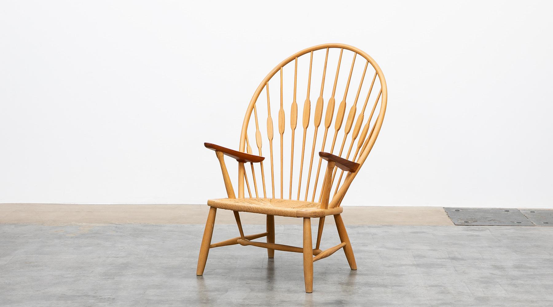 Peacock chair, ash, papercord by Hans Wegner, Denmark, 1947.

Ashwood frames with teak armrests and original paper cord seat make the iconic peacock chair by Hans J. Wegner a work of art. What makes it special is the fusion of ergonomics and