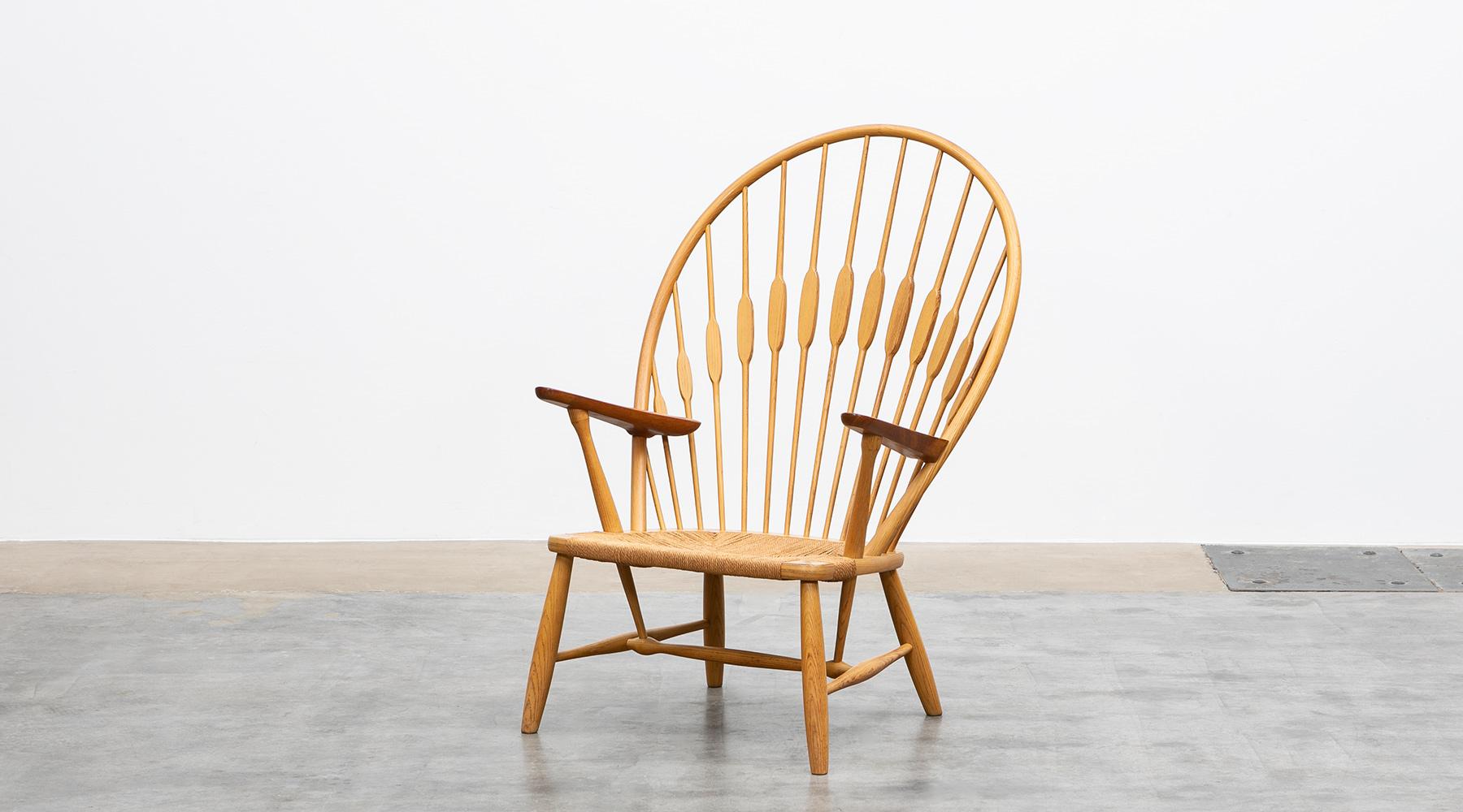 Peacock chair, ash, papercord by Hans Wegner, Denmark, 1974

Ashwood frames with teak armrests and original paper cord seat make the iconic peacock chair by Hans J. Wegner a work of art. What makes it special is the fusion of ergonomics and
