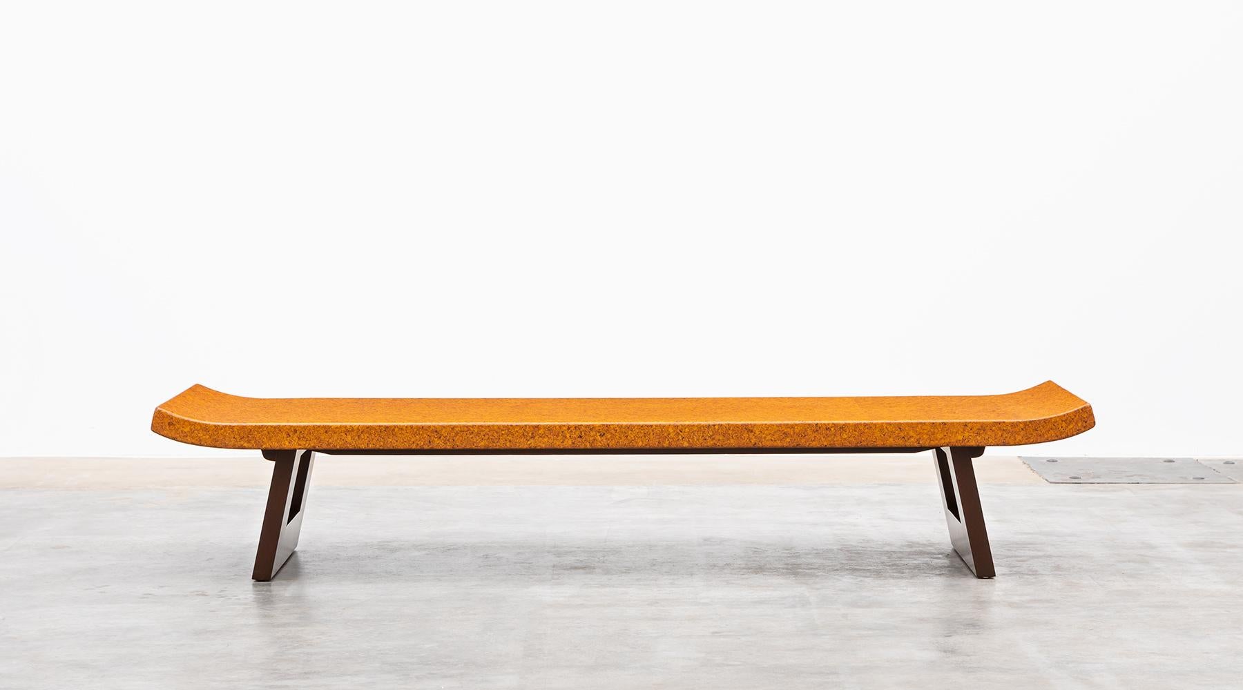 Coffee table from the middle of the century, designed by Paul Frankl. Eloquently shaped cork tabletop, on two wooden mahogany legs, each created in a rectangle. It can be used as a coffee table or as a bench. Made 1948 by Johnson