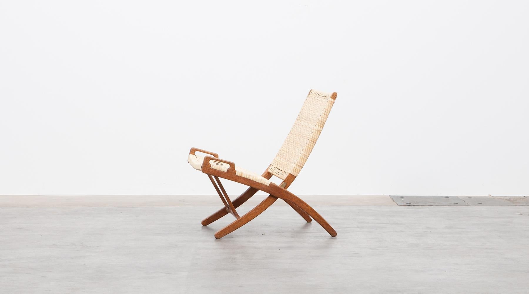 Danish 1940s Brown Oak and White Cane Folding Chair by Hans Wegner For Sale