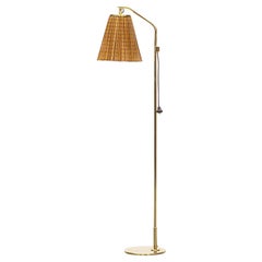1940s Brown Wicker and Brass Stem Floor Lamp by Paavo Tynell