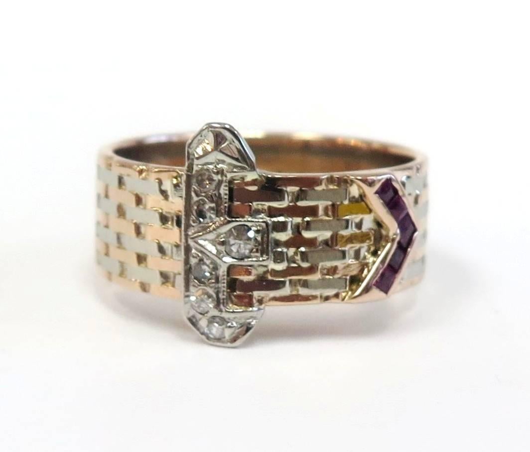A wonderful piece of romantic symbolism from the 1940s. The buckle ring, along with the snake ring, were popularized by Queen Victoria as symbols of a binding romantic love and later carried into the 20th century.

This wonderful diamond buckle ring