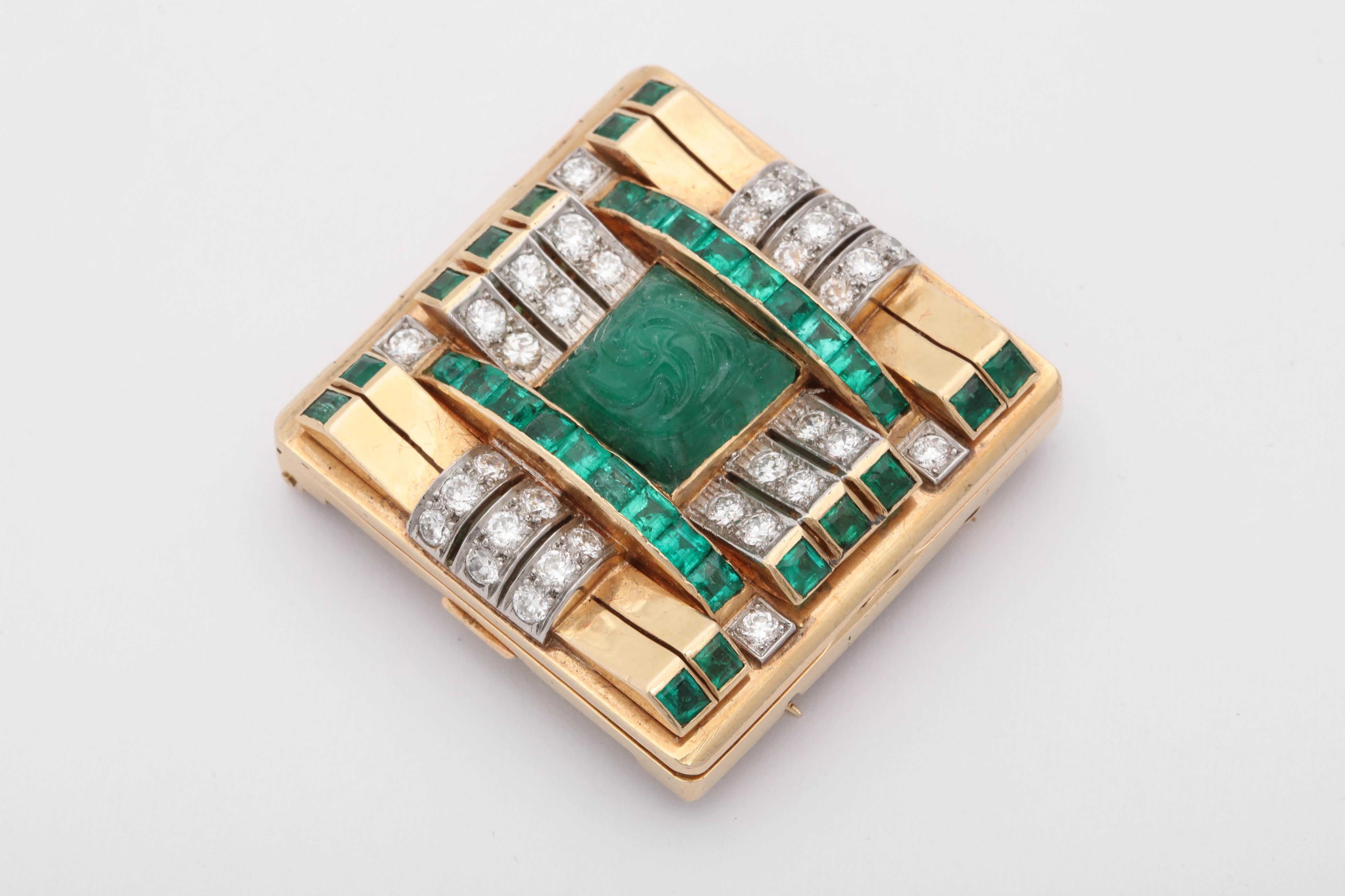 One Geometric Double Clip Brooch And Belt Buckle Unique Piece Of Jewelry Made Of 18kt Yellow Gold And Embellished With One Large Carved Beautiful Color Emerald Weighing Approximately 2 Carats. This Double Clip Brooch Is Also Designed With Numerous