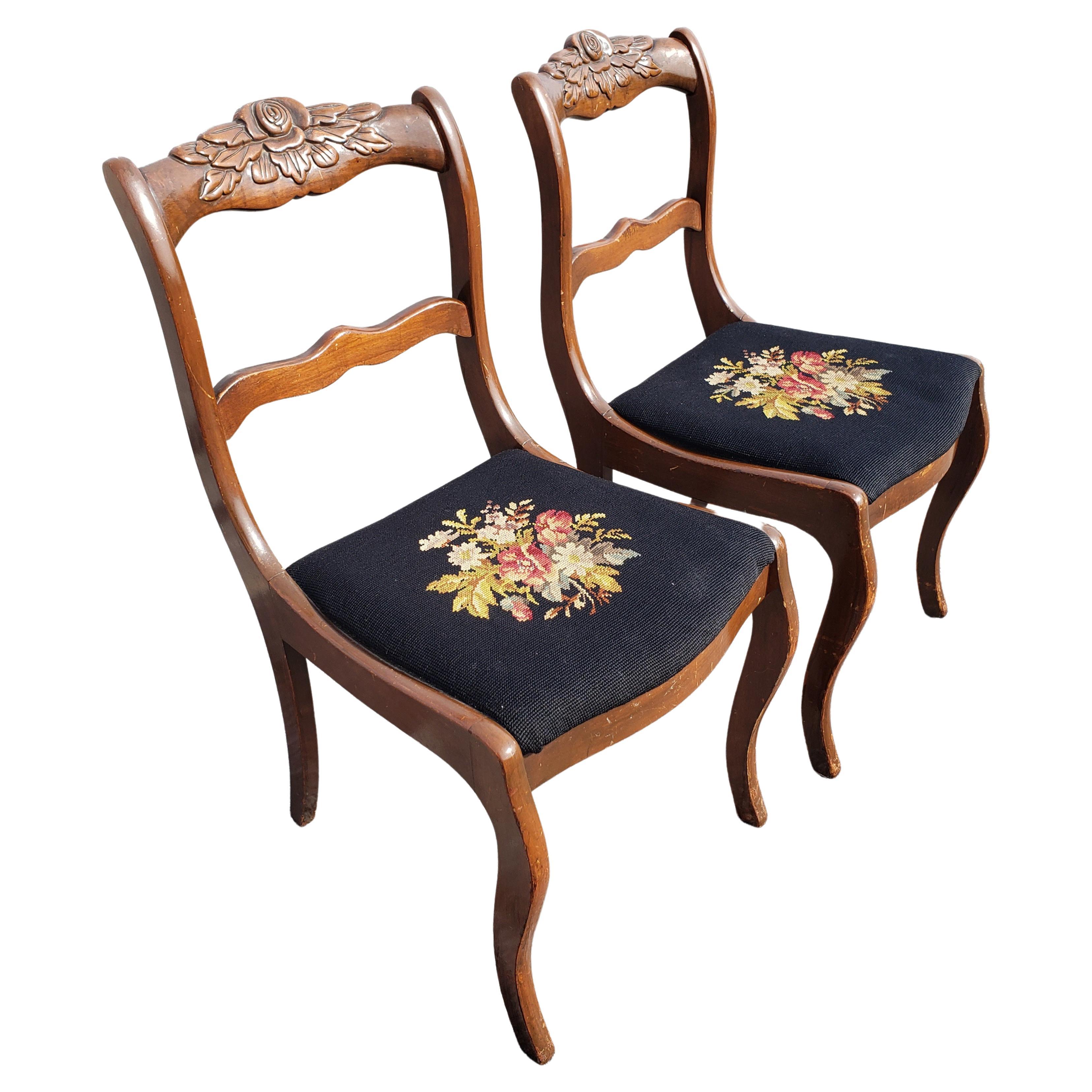 1940s Carved Ladder Back Needlepoint Seat Chairs. Good vintage condition. Needlepoint upholstery seat in good condition.
Measures 17