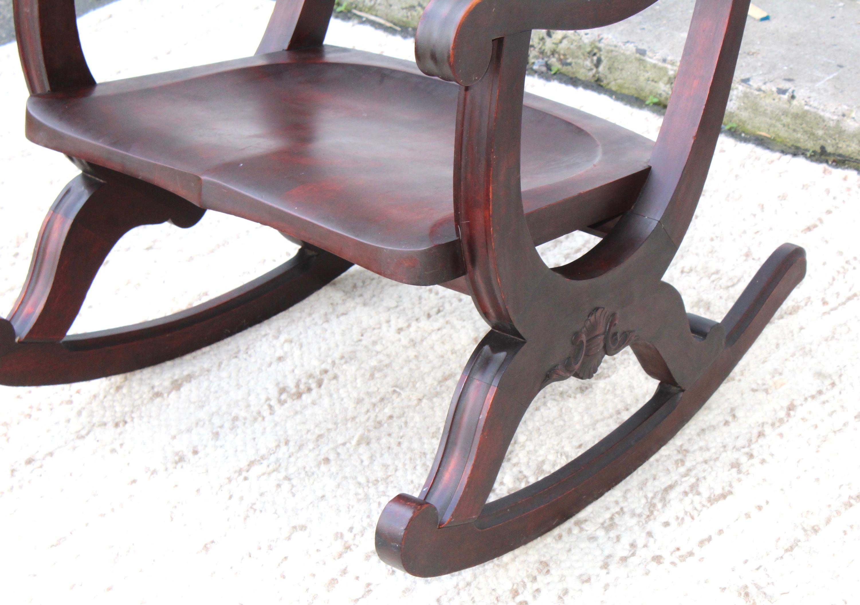 1940s Carved Mahogany Rocking Chair 1