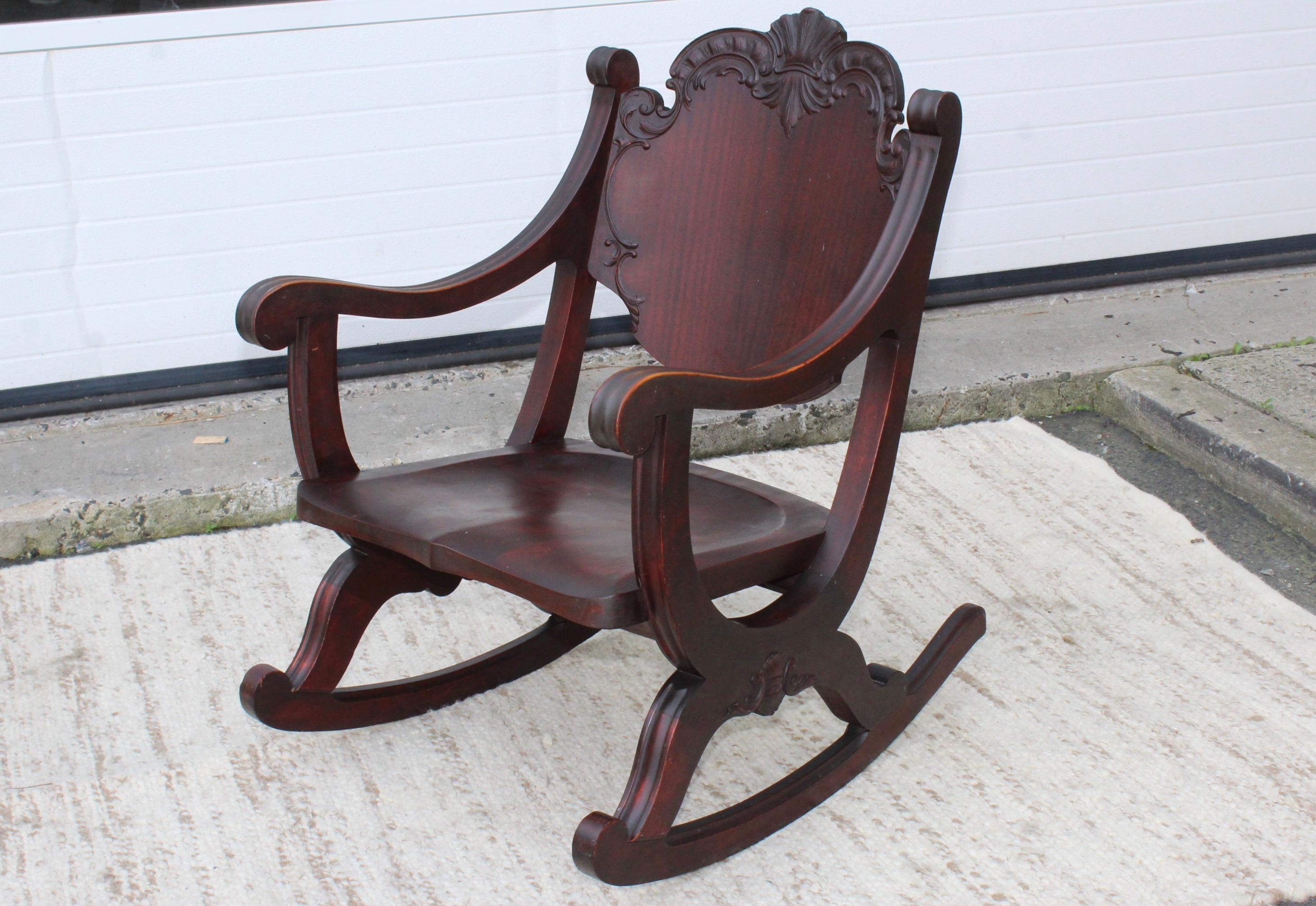 1940s carved mahogany rocking chair in original vintage condition.