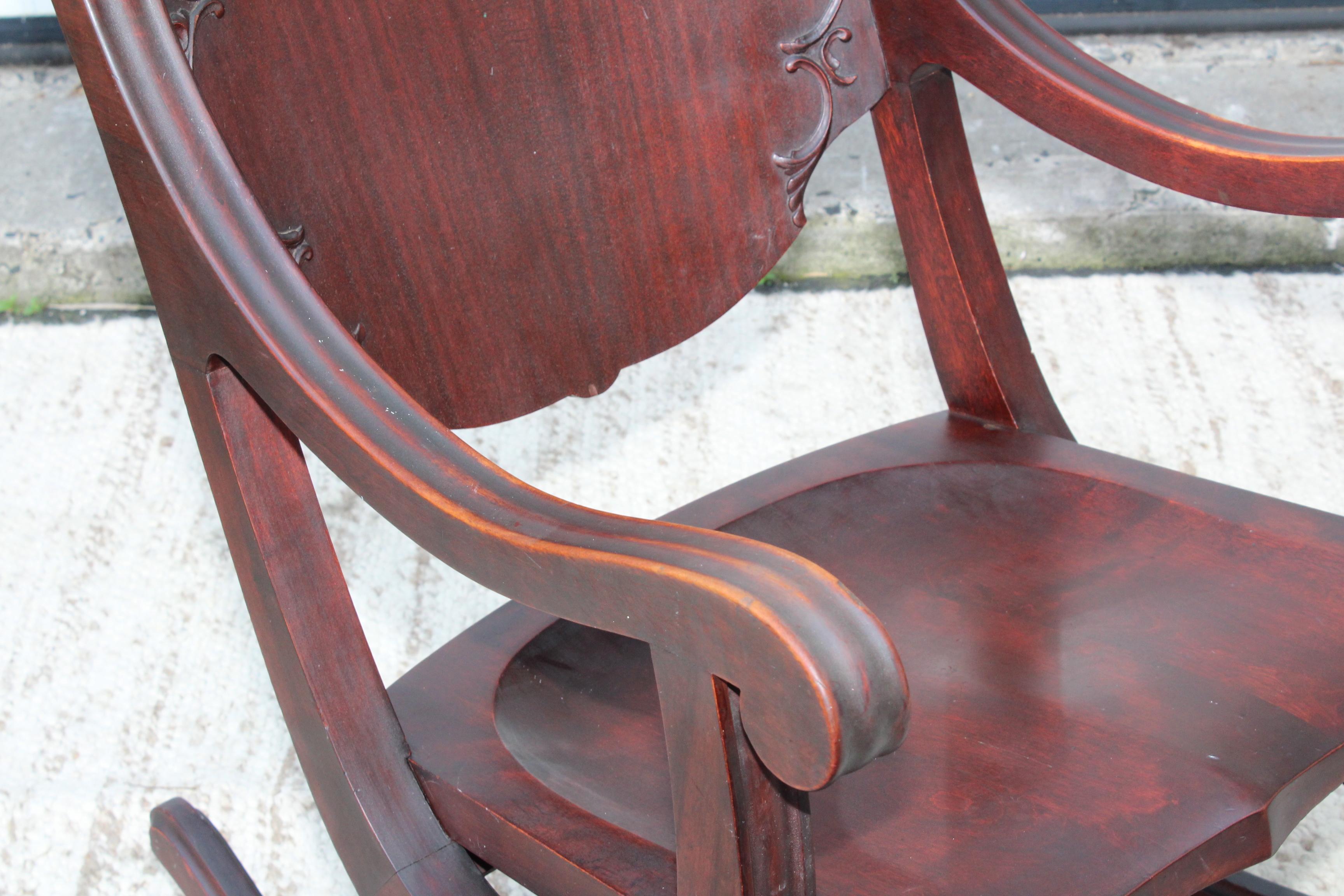 1940s Carved Mahogany Rocking Chair 1