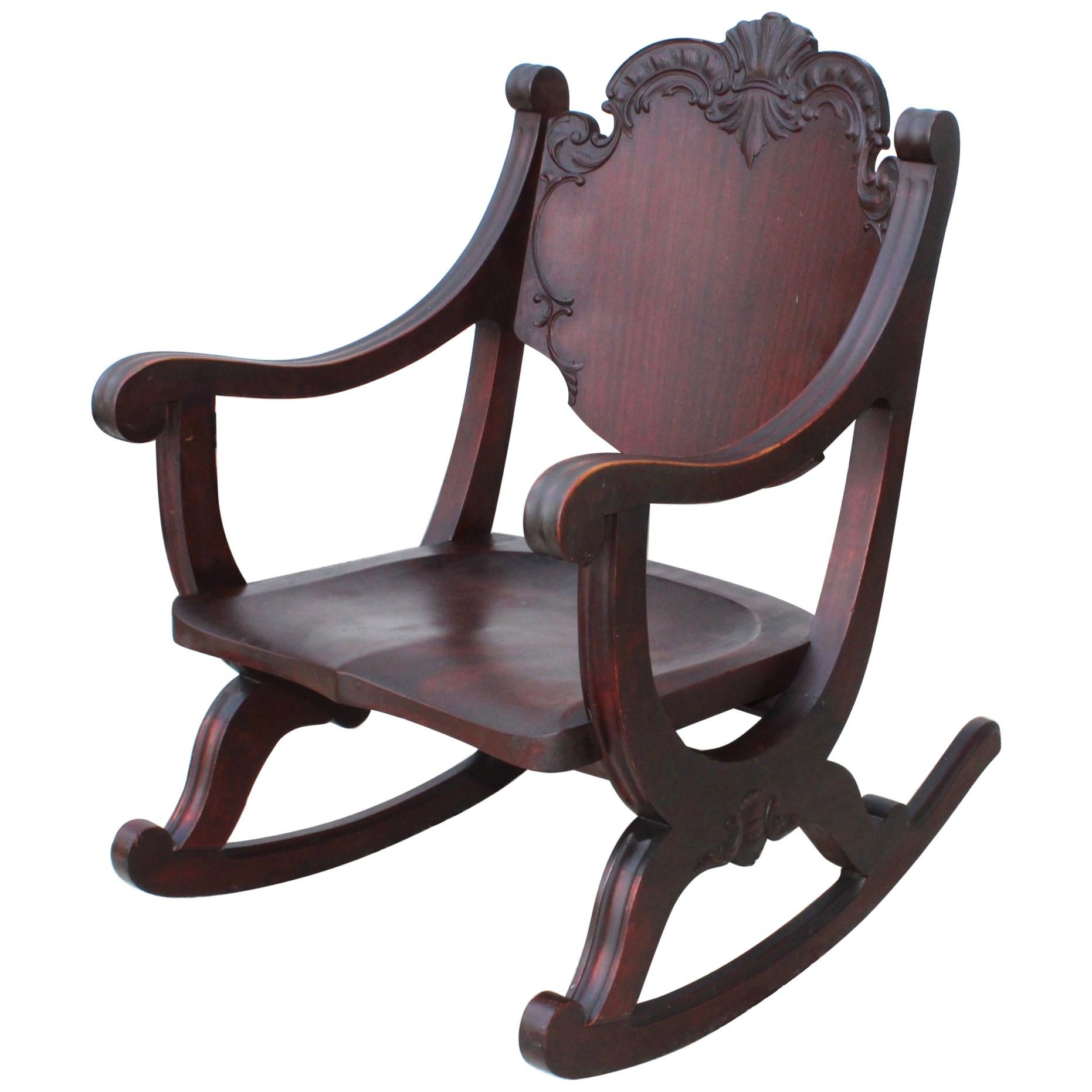 1940s Carved Mahogany Rocking Chair