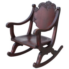 1940s Carved Mahogany Rocking Chair