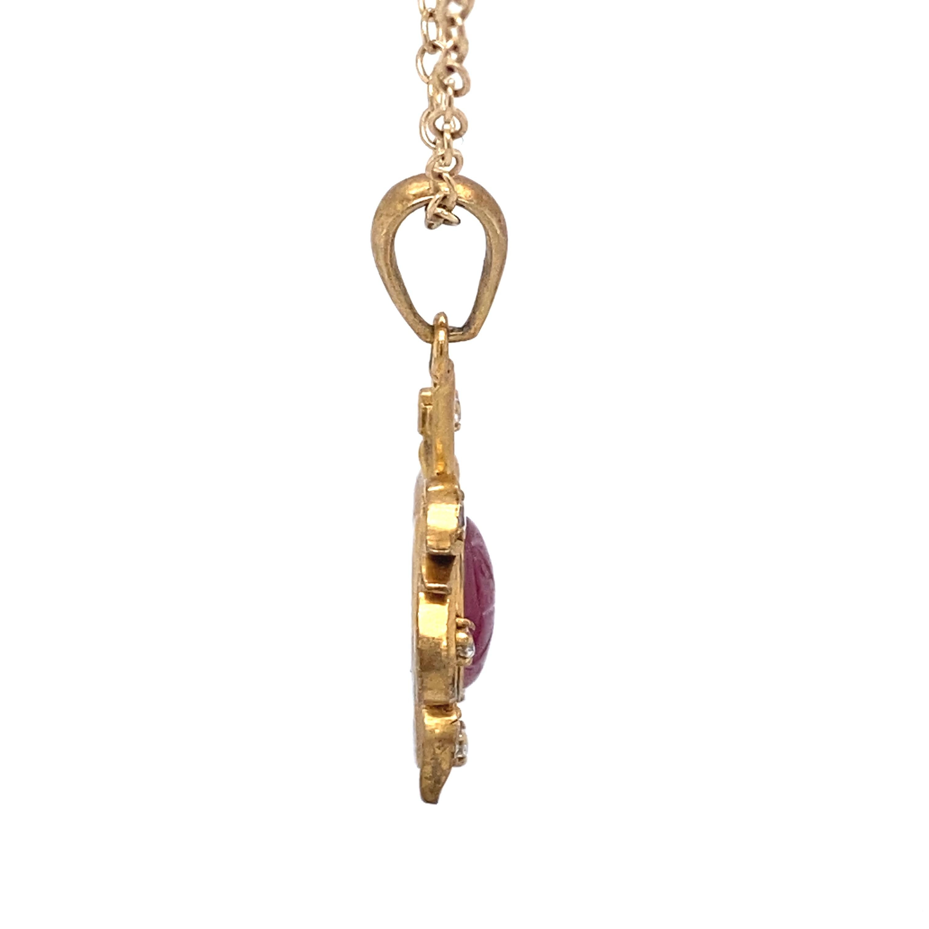 Retro 1940s Carved Ruby and Diamond Pendant in 14 Karat Gold For Sale