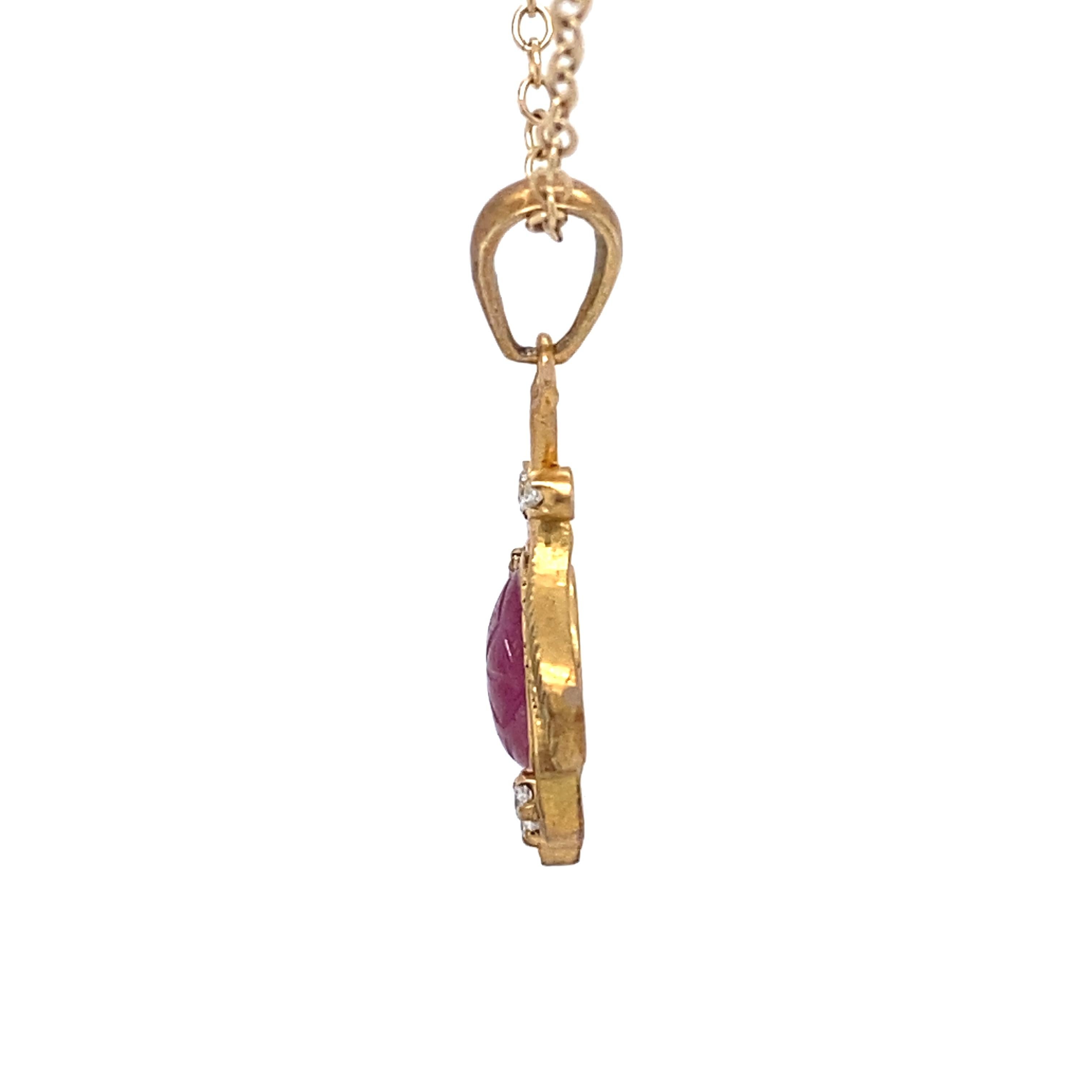 1940s Carved Ruby and Diamond Pendant in 14 Karat Gold In Excellent Condition For Sale In Atlanta, GA