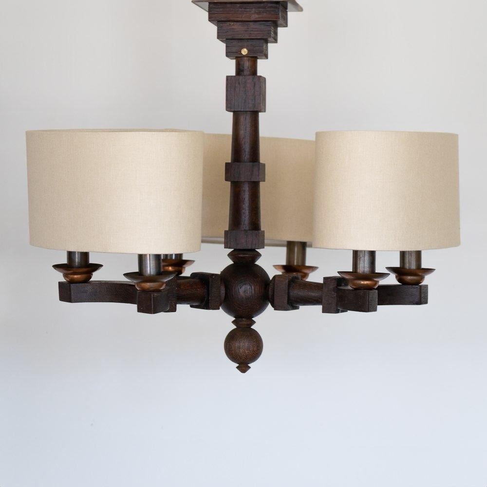 Metà XX secolo Lampadario in legno intagliato degli anni '40 di Charles Dudouyt in vendita