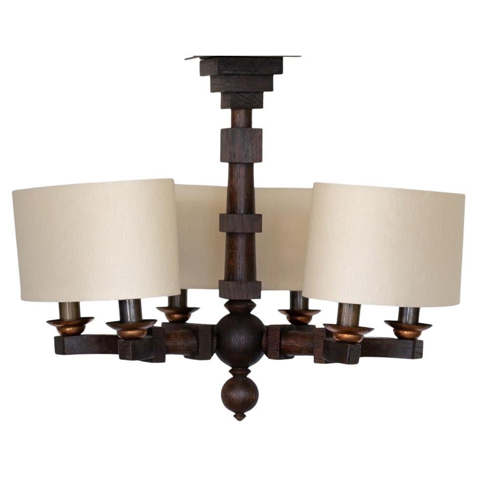 Lampadario in legno intagliato degli anni '40 di Charles Dudouyt in vendita
