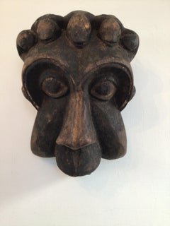 Geschnitzte Holzmaske aus den 1940er Jahren