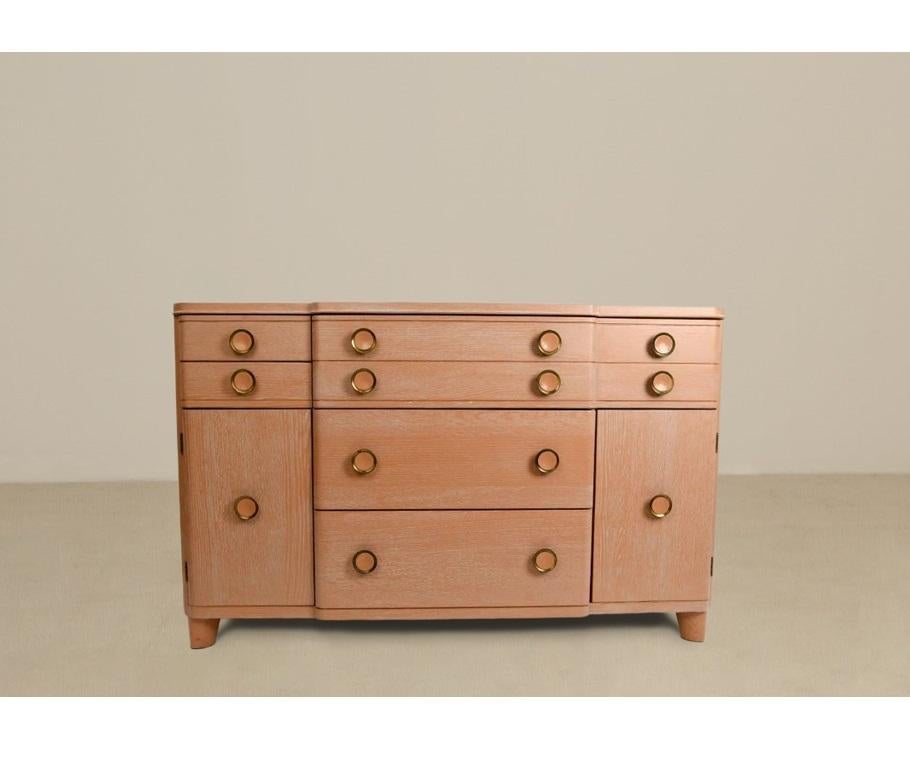 Clean Modernist lines, a gorgeous dresser or sideboard dating from the 1940's, produced by Huntington Chair Corp - Huntington, West Virginia. Oak grain in cerused finish gives it a unique style that makes it stand out even more from the rest. The