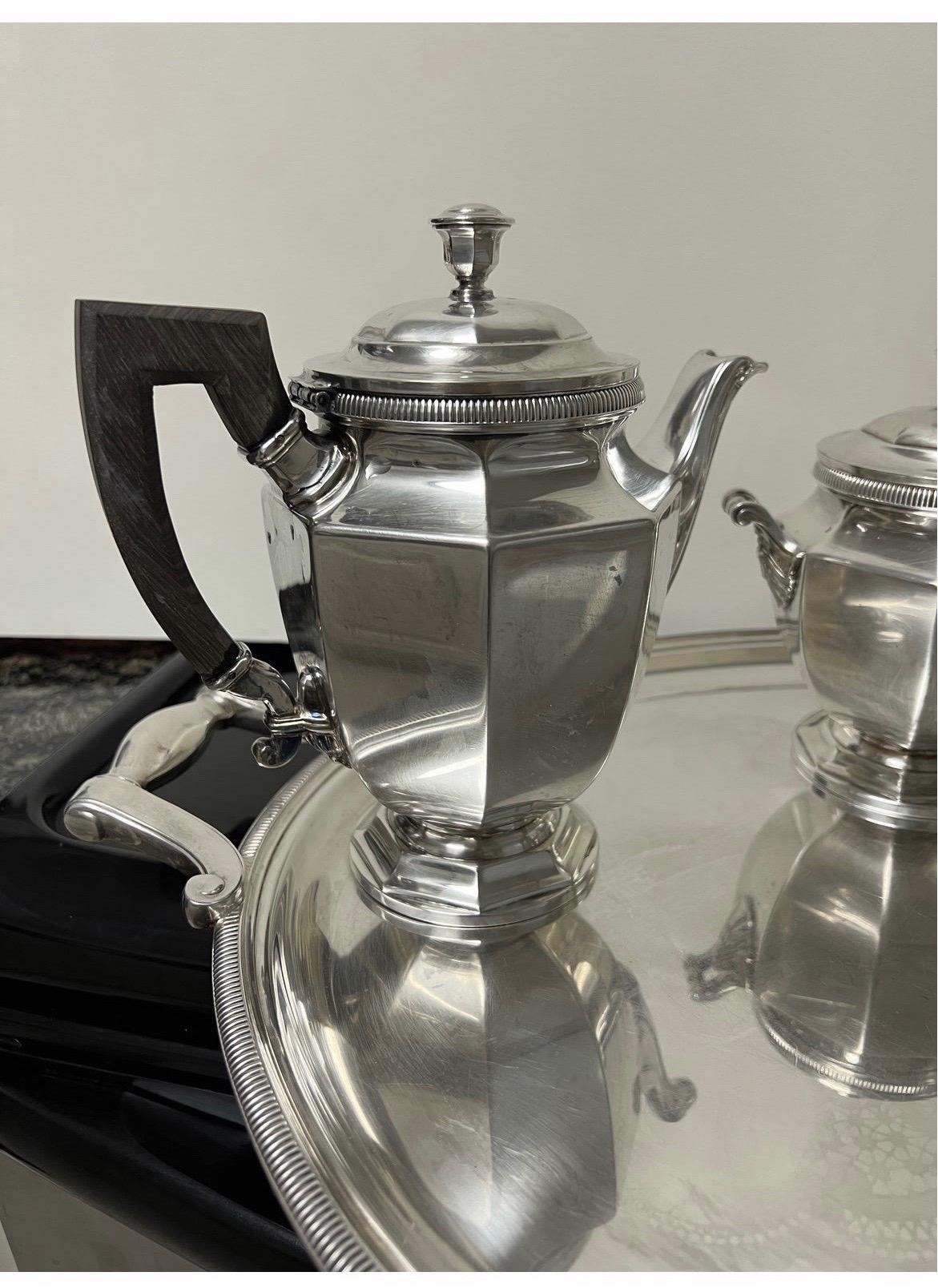 Beautiful 5 pc coffee and tea set including oversized butler’s tray. 
Tray: 24.5” w x 16.5” d
Coffee Pot: 9.75” h x 7.875” d x 4.25” w
Teapot: 8” h x 8” d x 4.5” w
Sugar bowl: 6.5” h x 6.25” w 
Creamer: 5.25” h x 4.75” d.