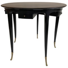 1940s Circular Black Ebonised Italian Games Table with Drawers and Brass Sabots