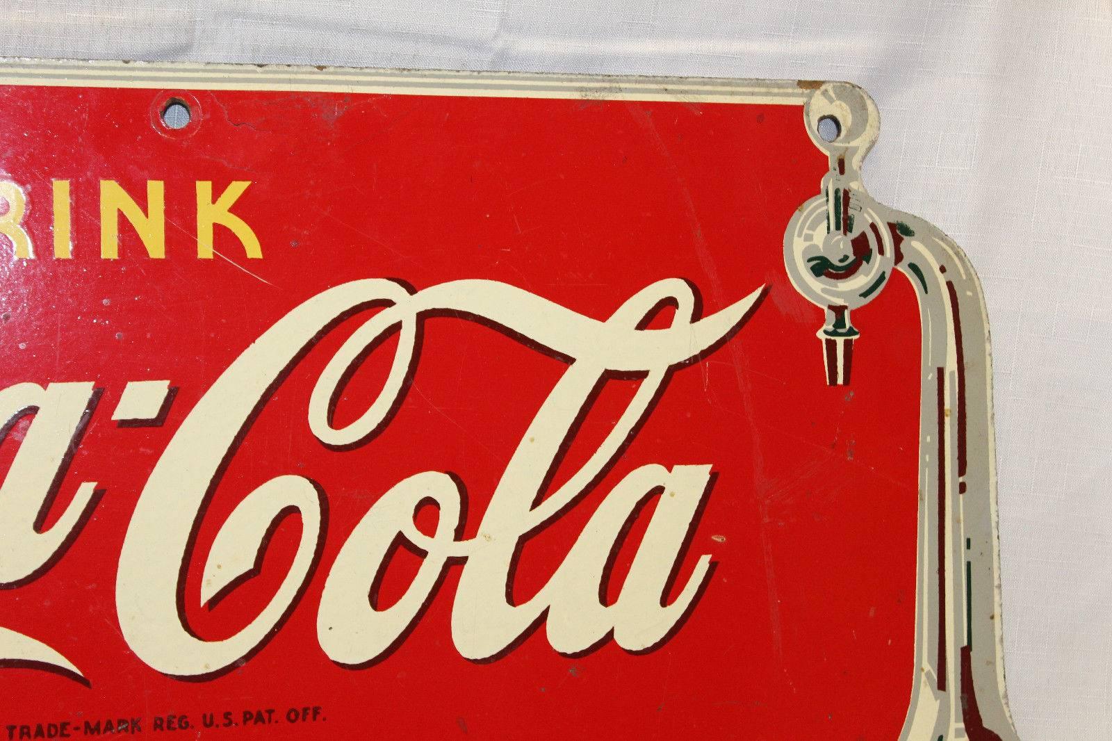 Amazing condition for a masonite sign. Most masonite signs were ruined or destroyed over time due to its fragile nature to other elements. Signs were generally tin or porcelain however coca cola made all kinds of advertising. This is one great