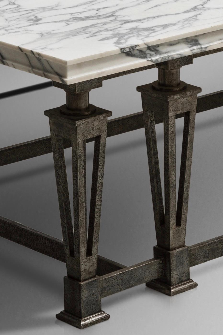 A rare and important spindle feet console in patinated wrought iron with a spectacular carrare marble
A similar model is located at the Louvre museum at the bronze room into the decorative arts department.
Gilbert Poillerat is considered as the most