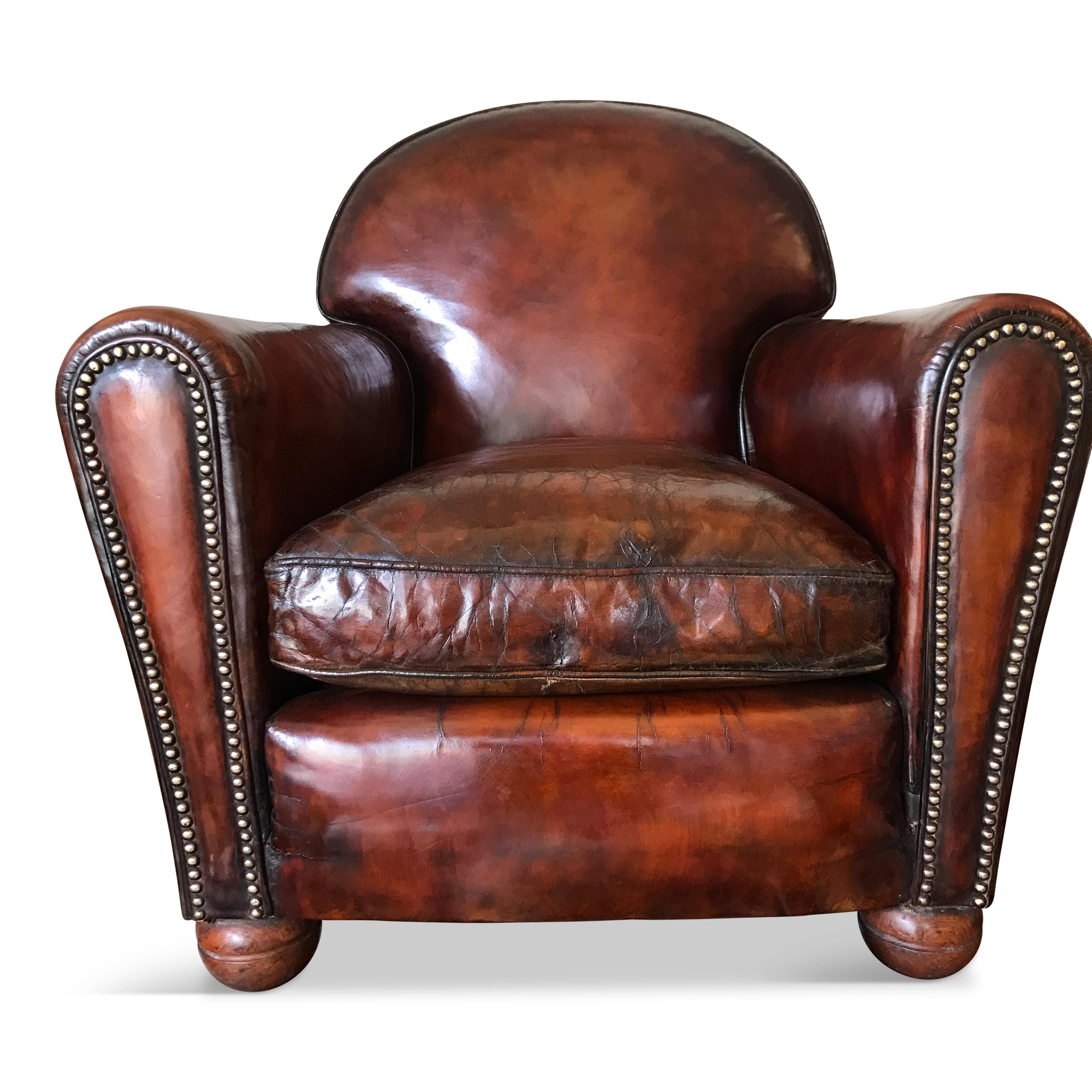 1940s compact conquer brown leather armchair from Belgium.

Incredibly stylish and a great addition to the room.