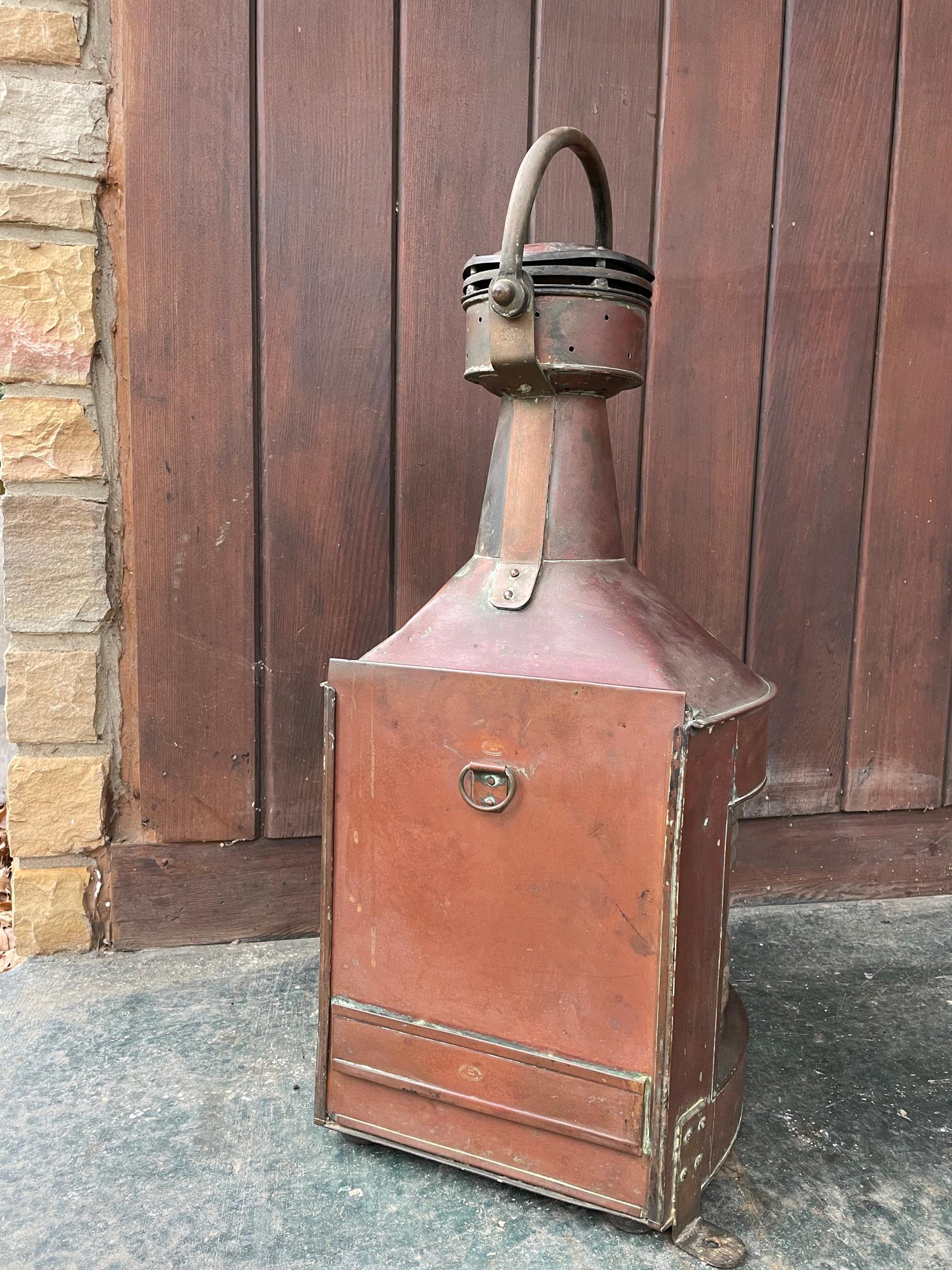 Rare to be presented in unmolested and unpolished condition. No electric light source, would need this to be added.

A large C.P.G. & Sons STARBOARD copper and brass ships lantern with fresnel lens, one small chip to lens, marked, C.P.G. & Sons