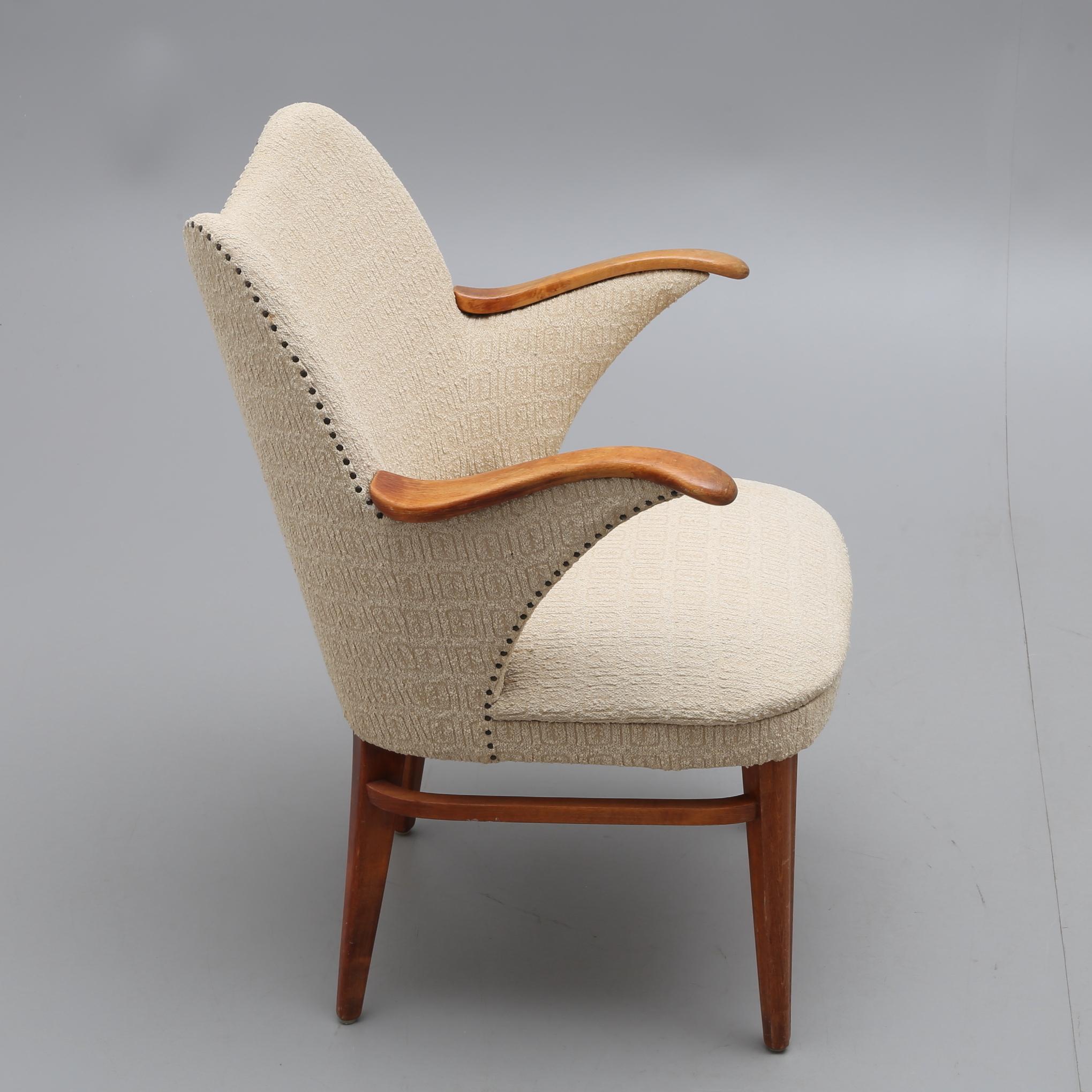 cream mid century armchair