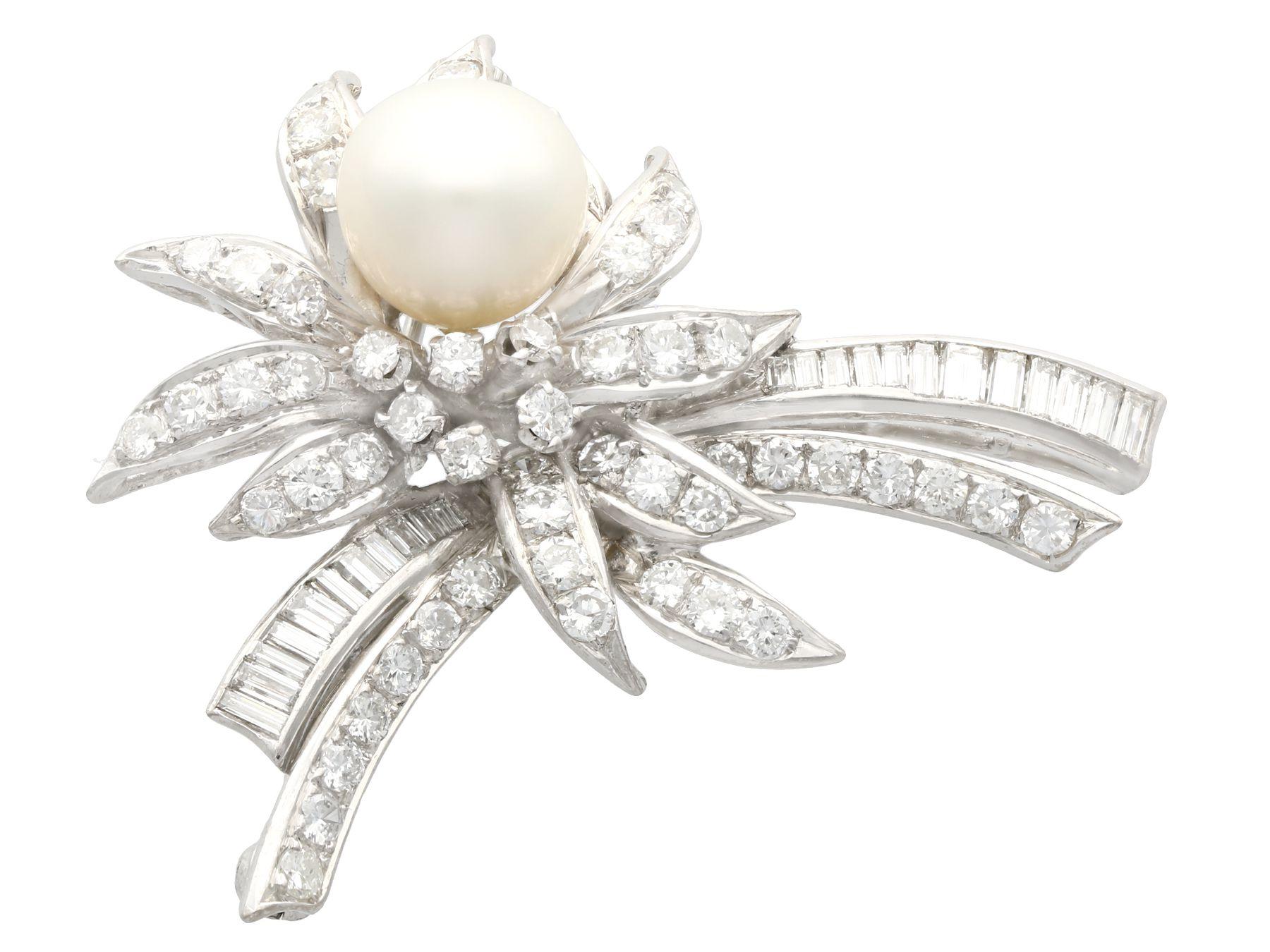 An impressive vintage 1940s 3.92 carat diamond and cultured pearl brooch crafted in 12 karat white gold; part of our diverse vintage jewelry and estate jewelry collections.

This stunning, fine and impressive vintage brooch has been crafted in 12k
