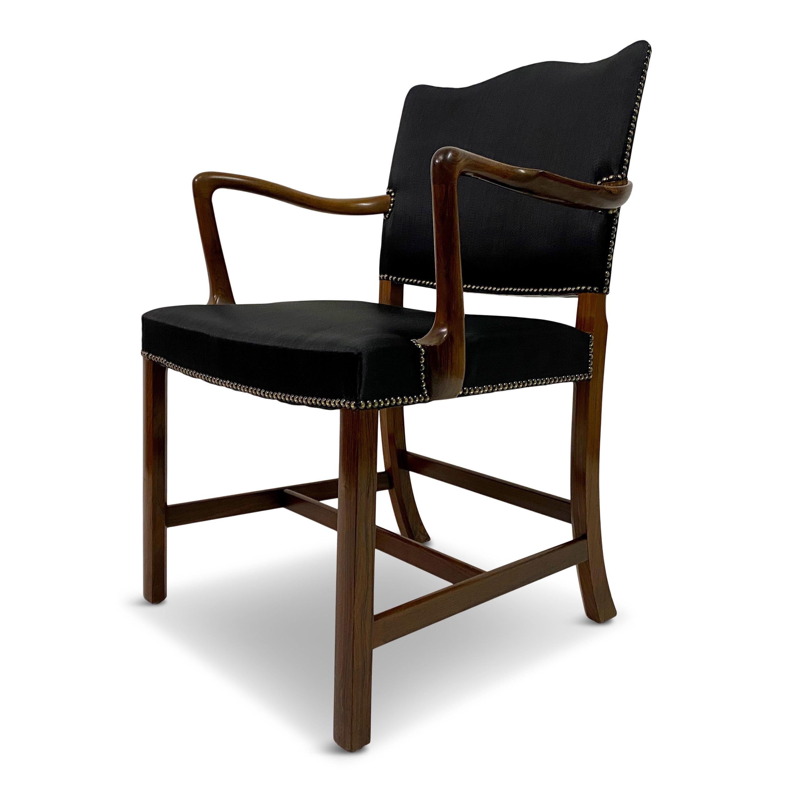 Armchair or desk chair

By Ole Wanscher

Made by A.J Iversen 

New horsehair upholstery by John Boyd Textiles

Fantastic quality with exceptional wood working details.

Denmark 1940s.