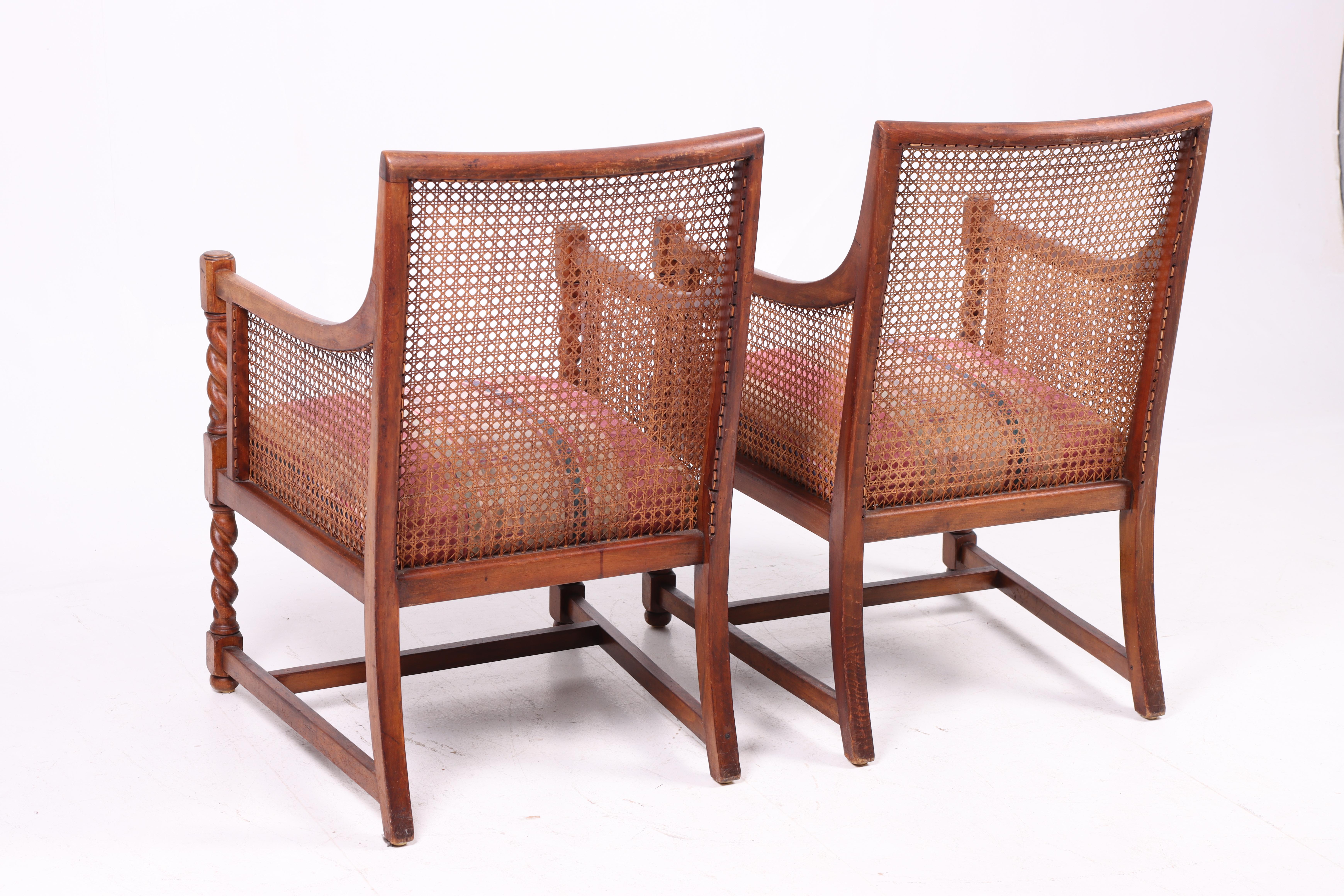 Metà XX secolo Sedie bergère danesi degli anni '40 con canna francese e struttura in faggio tinto in vendita