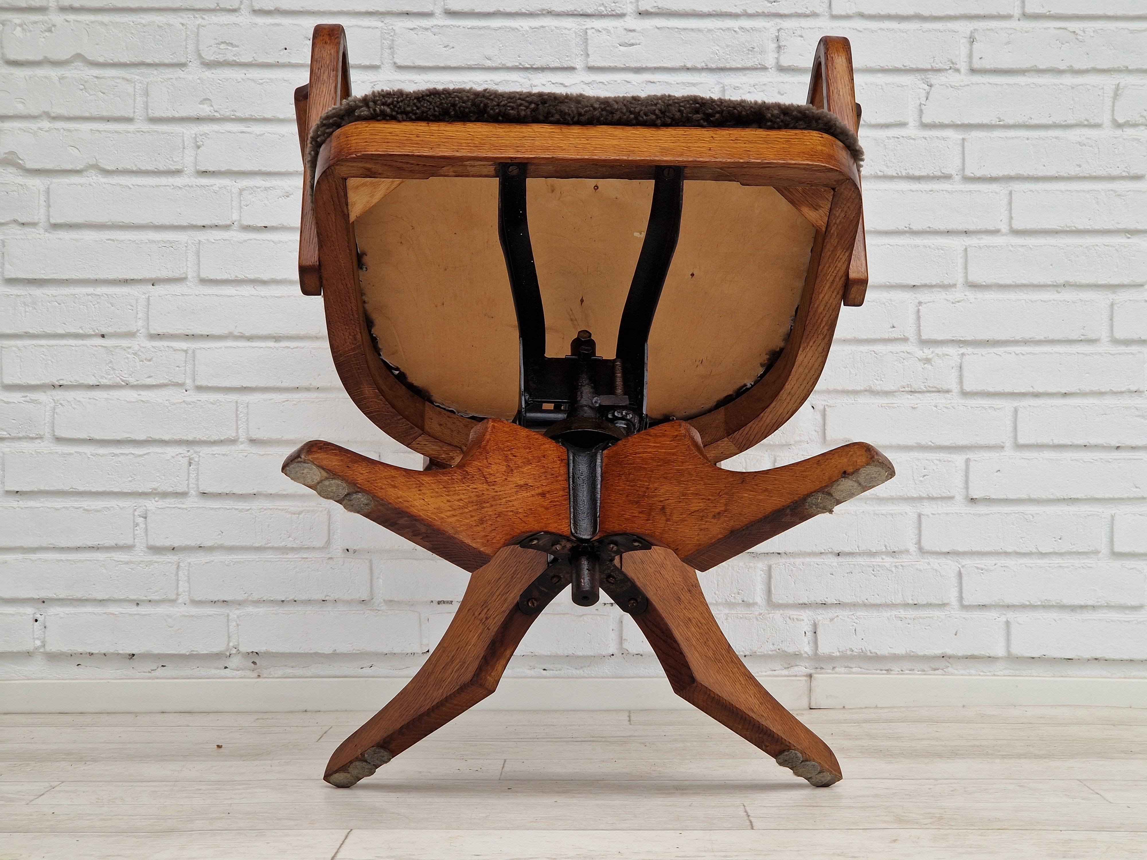 1940s, Danish design, reupholstered swivel chair, tilt function, lambskin. For Sale 11