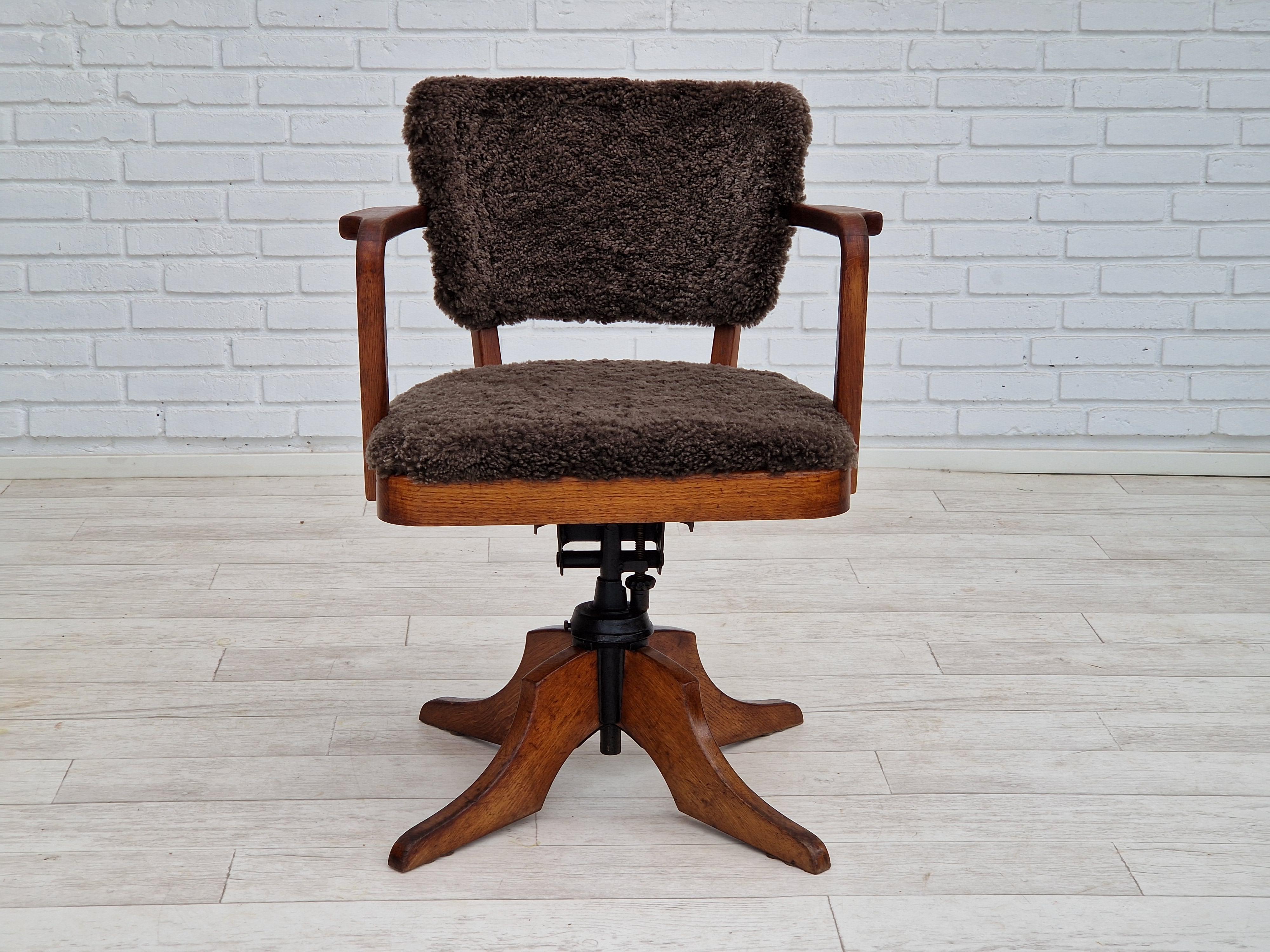 Scandinavian Modern 1940s, Danish design, reupholstered swivel chair, tilt function, lambskin. For Sale