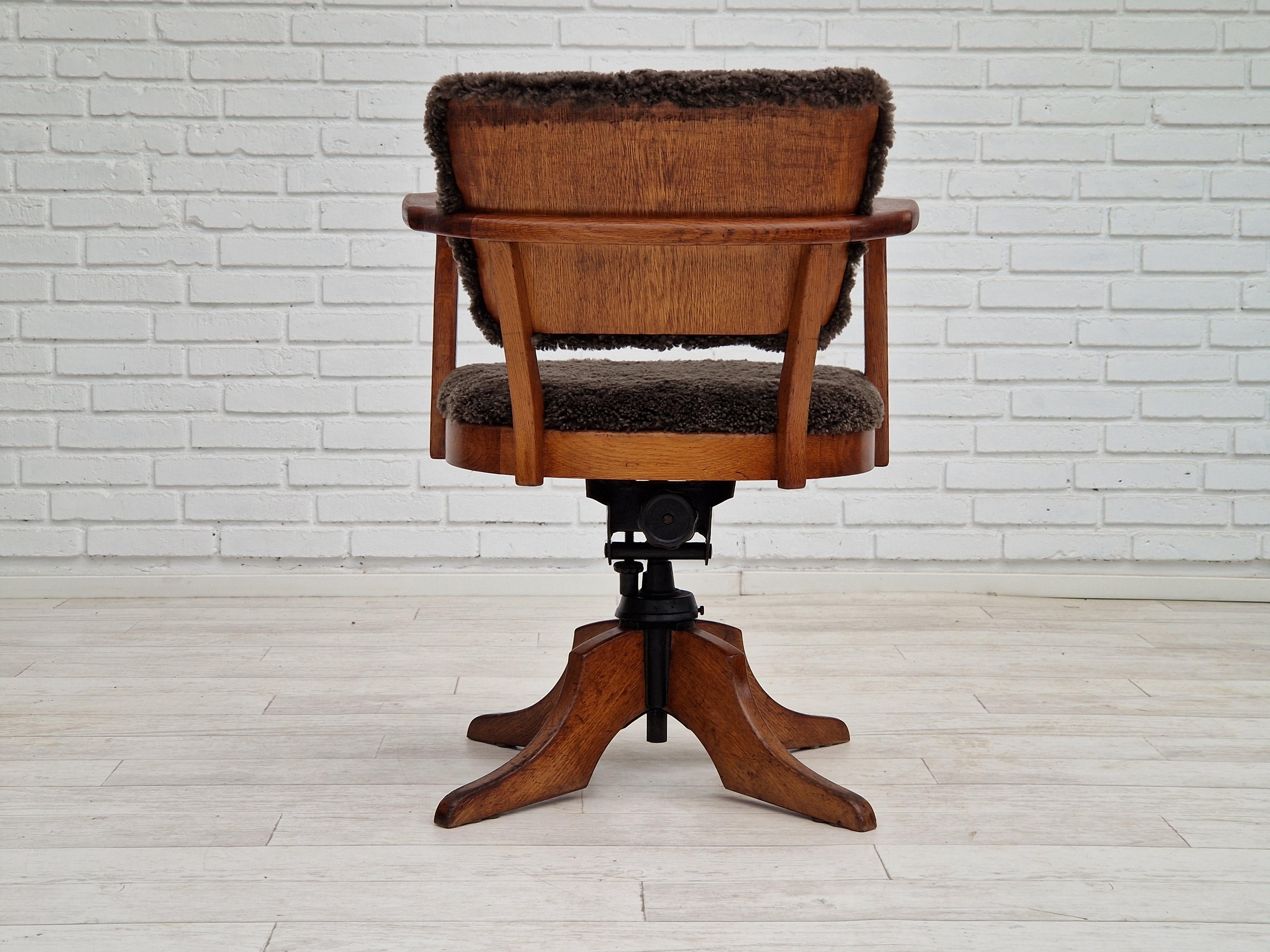 Lambskin 1940s, Danish design, reupholstered swivel chair, tilt function, lambskin. For Sale