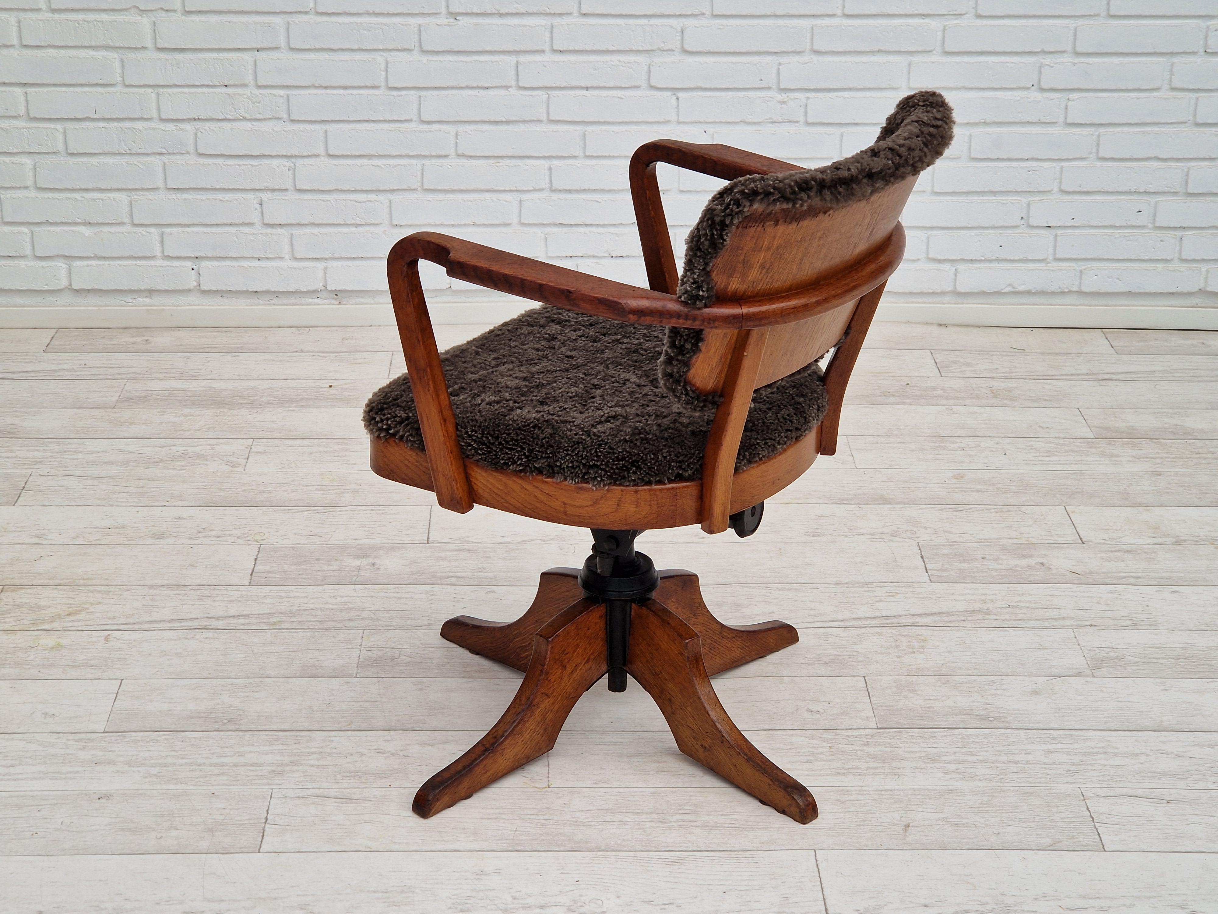 1940s, Danish design, reupholstered swivel chair, tilt function, lambskin. For Sale 1
