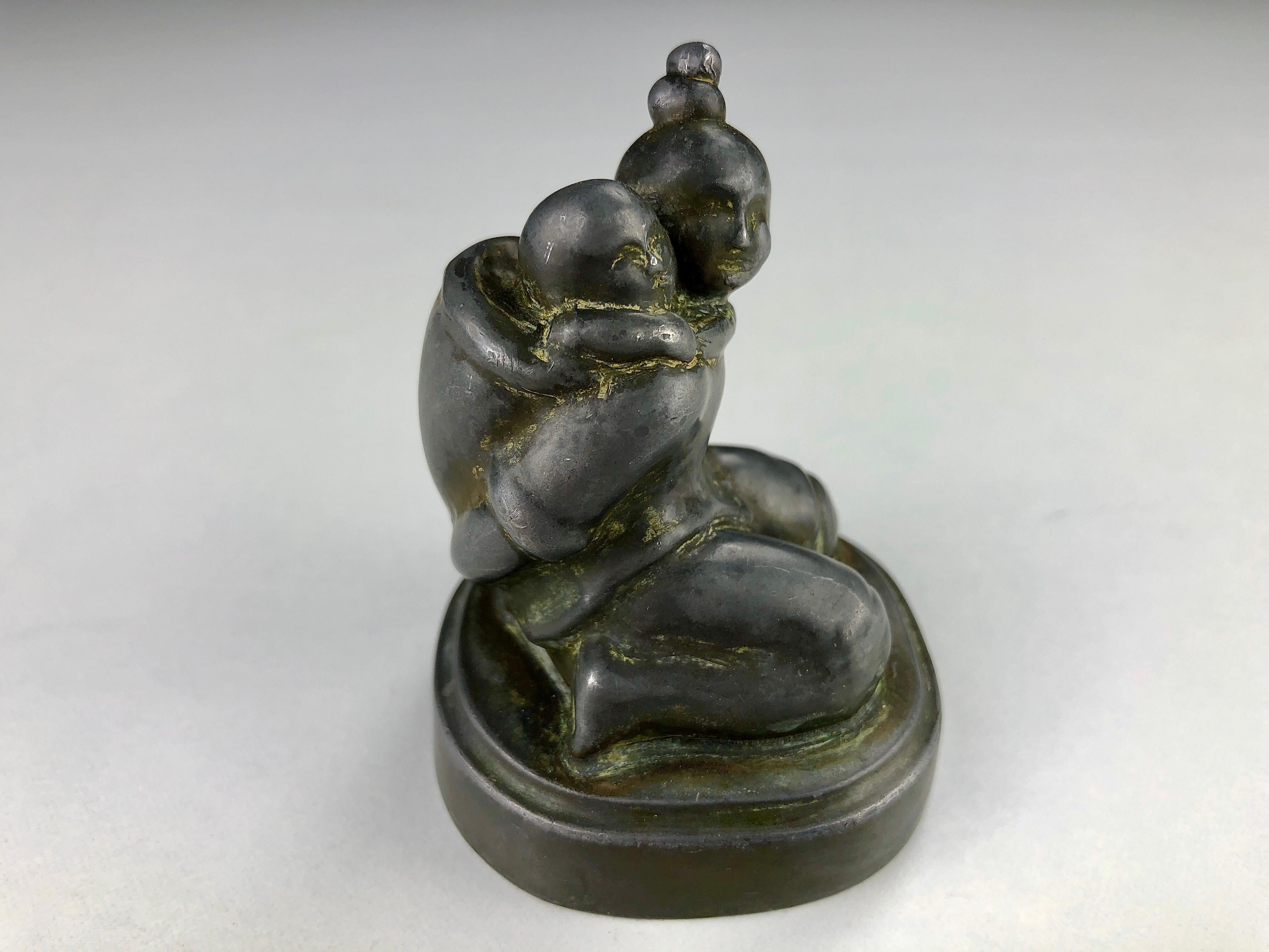 1940s Danish Just Andersen Disco Metal Figurine of Inuit Mother and Child For Sale 1