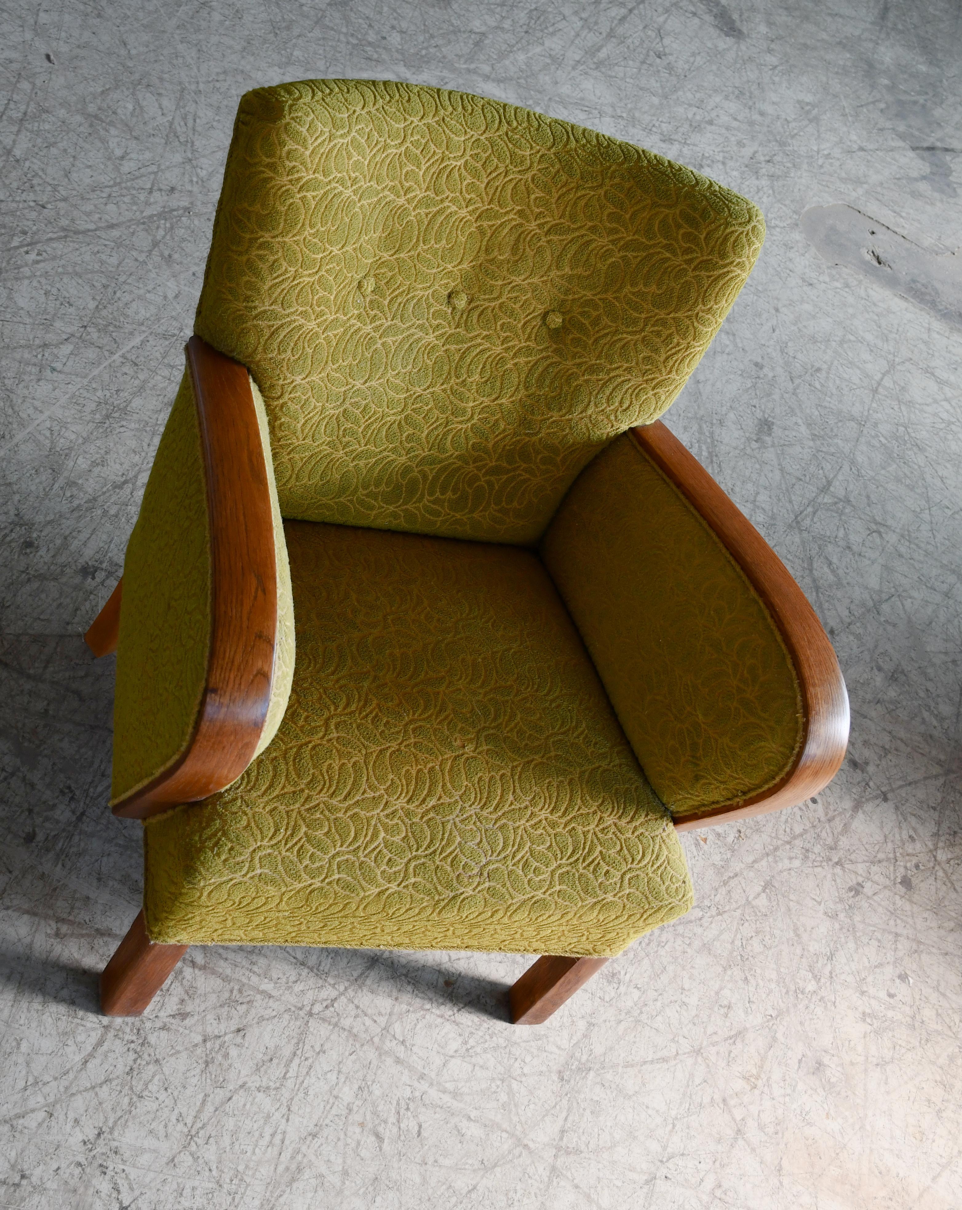 Mid-Century Modern 1940s Danish Late Art Deco or Early Midcentury Lounge Chair With Oak Armrests For Sale