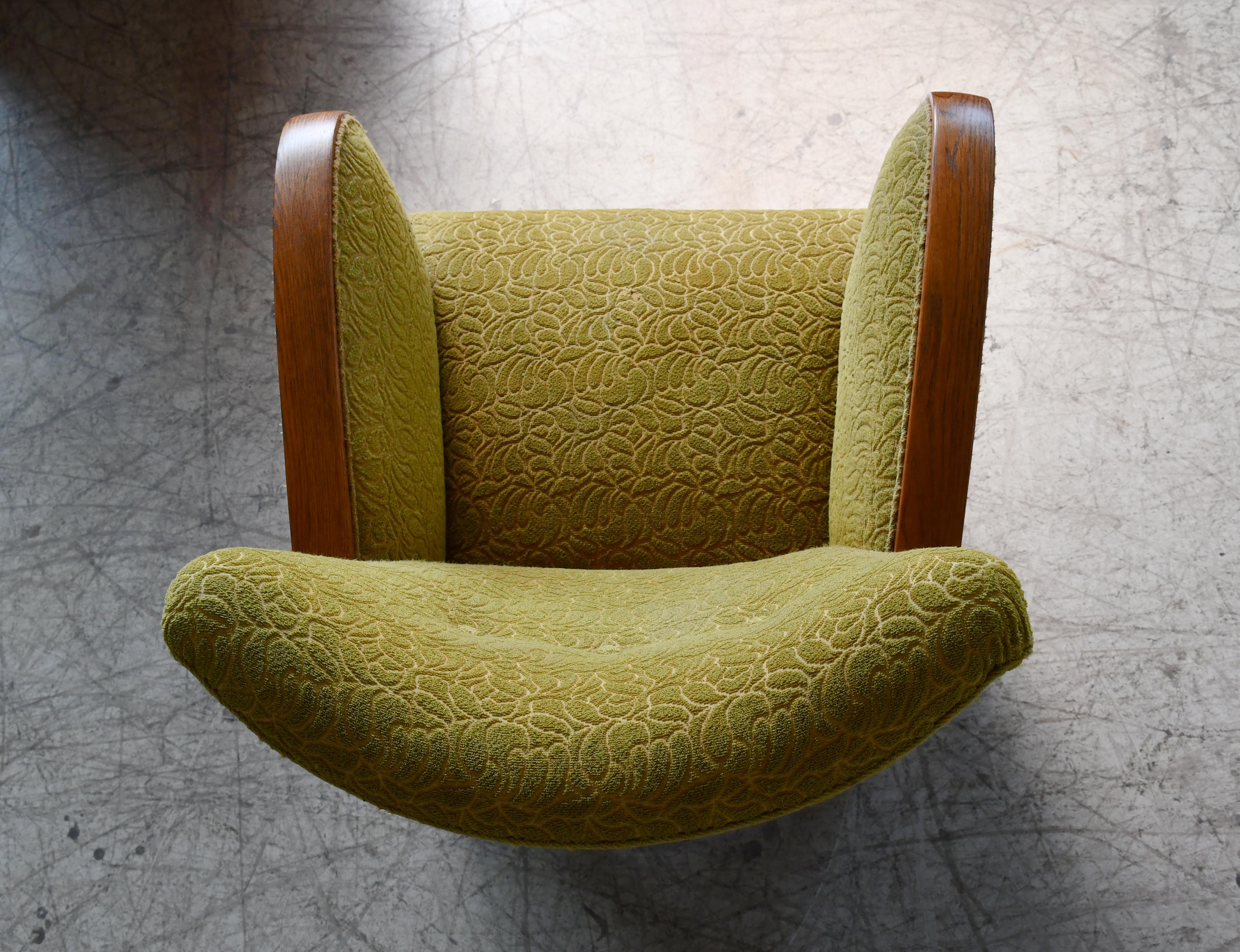 Wool 1940s Danish Late Art Deco or Early Midcentury Lounge Chair With Oak Armrests For Sale