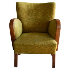 1940s Danish Late Art Deco or Early Midcentury Lounge Chair With Oak Armrests