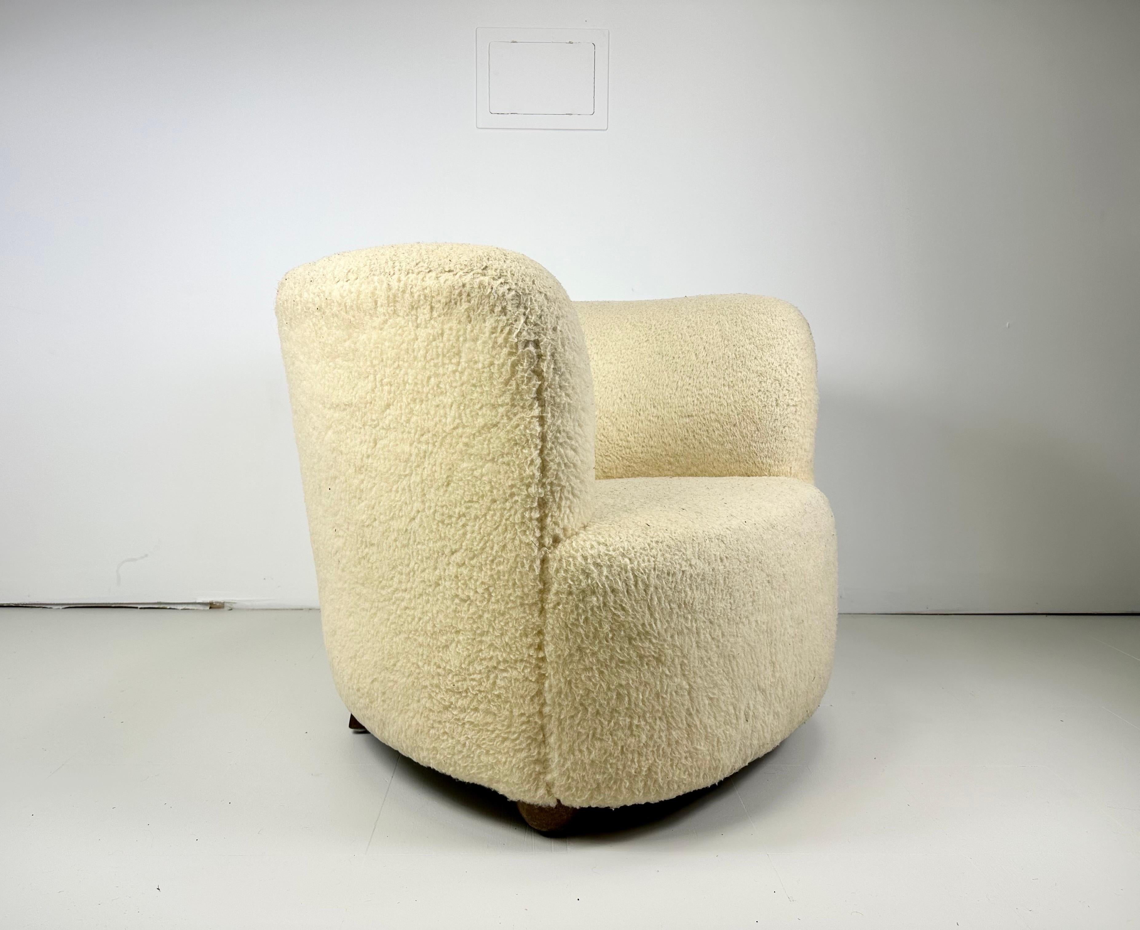 1940’s Danish Barrel Lounge. Original vintage faux shearling upholstery. Birch legs.

This listing is for one chair. We do have a similar chair that was paired with chair originally in a separate listing. We do show one image of the chairs together