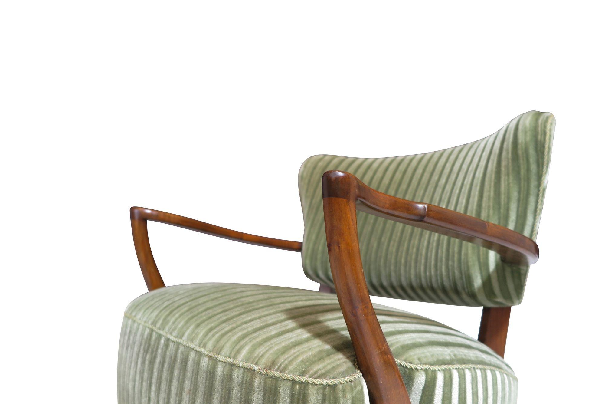 1940's Scandinavian lounge chair featuring a carved wooden frame of stained beechwood, eight-way hand-tied copper spring seat, covered in cotton and the original green striped mohair. Excellent original condition.

Measurements
W 28.66 x D 29.50 x H