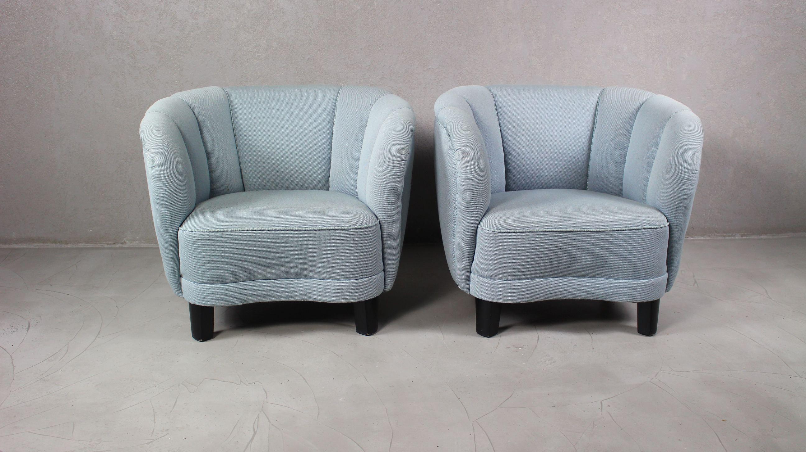 Pair of Danish lounge chairs perfectly capturing the essence of 1940s Danish design coming out of the Art Deco era and into the midcentury.
The curved backrests and low slung proportions and block feet in beechwood clearly hint at inspiration from
