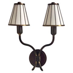 1940s danish wall lamp with teak base and patinated brass arms, linen shades.